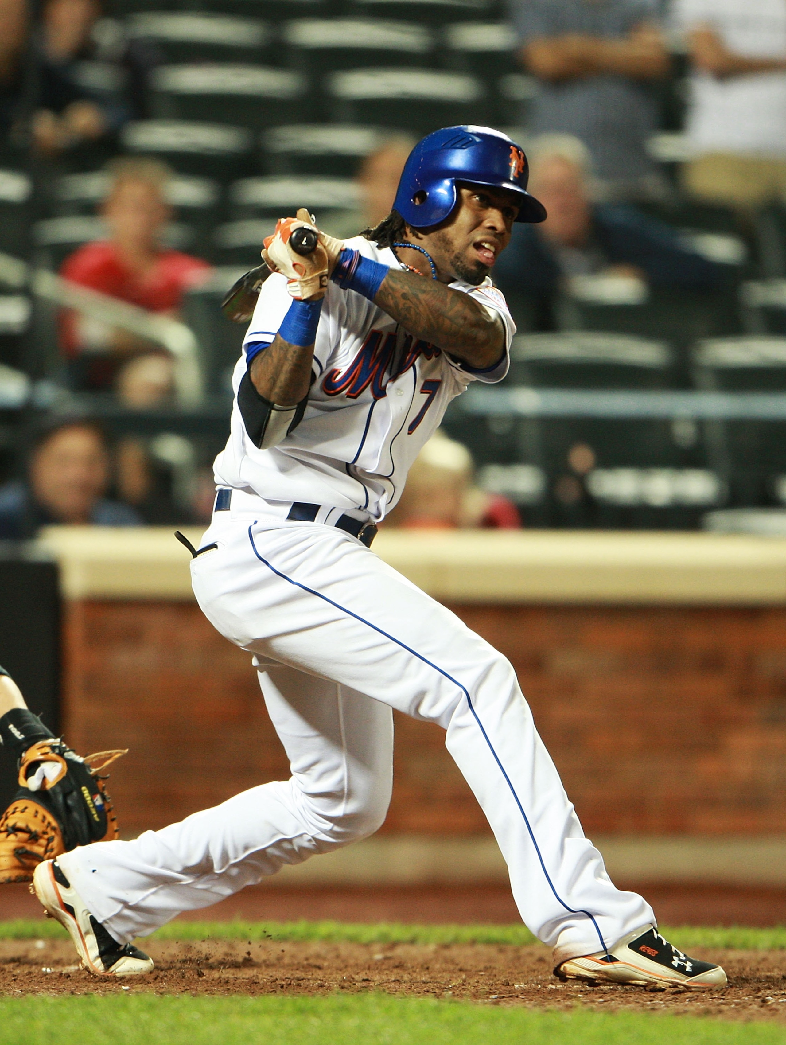 NEW YORK - AUGUST 25:  Jose Reyes #7 of the New York Mets ground out in the ninth inning against the Florida Marlins on August 25, 2010 at Citi Field in the Flushing neighborhood of the Queens borough of New York City.  (Photo by Andrew Burton/Getty Image