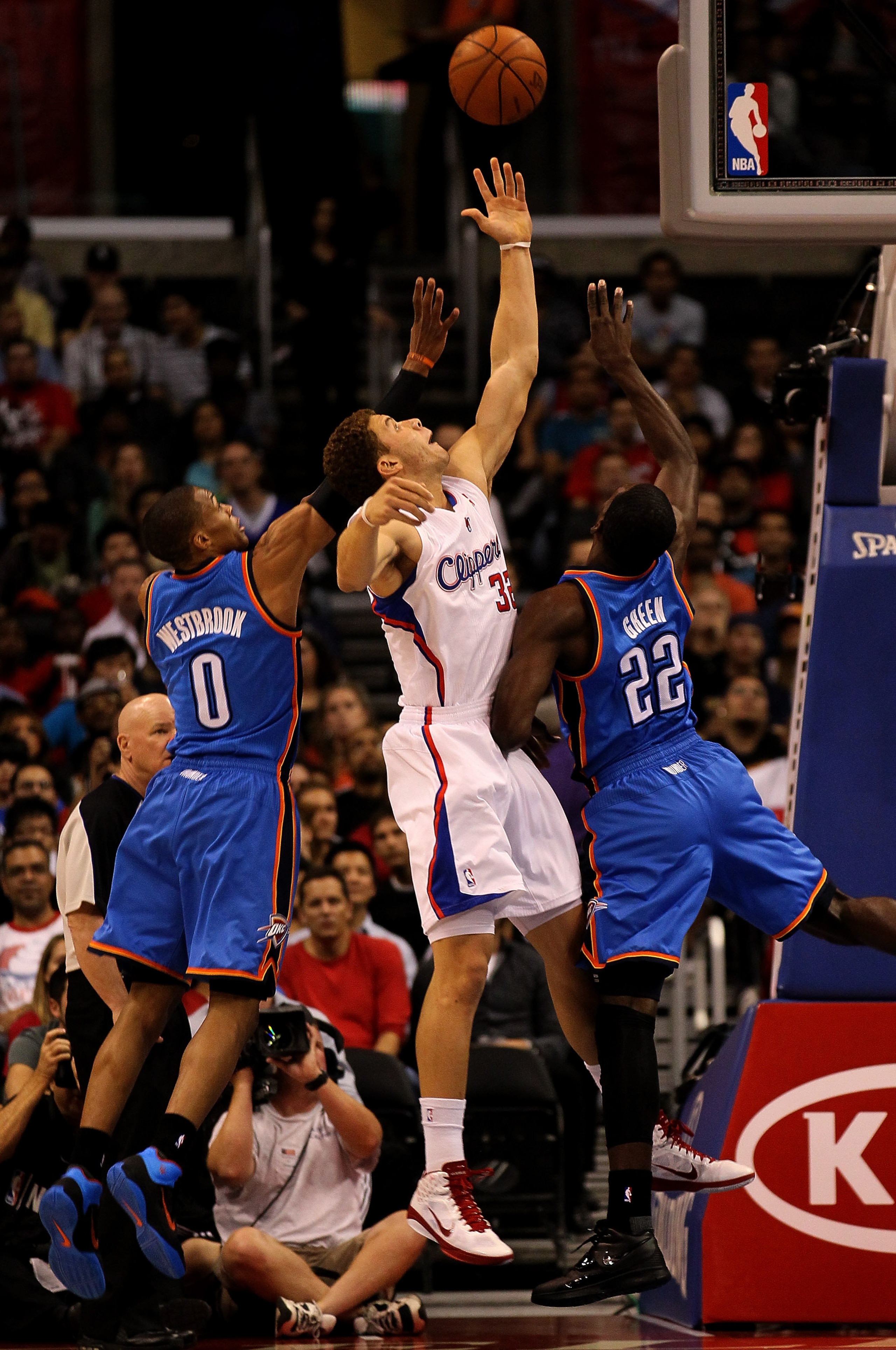 LOS ANGELES, CA - NOVEMBER 03:  Blake Griffin #32 of the Los Angeles Clippers goes up for a rebound between Russell Westbrook #0 and Jeff Green #22 of the Oklahoma City Thunder at Staples Center on November 3, 2010 in Los Angeles, California. The Clippers