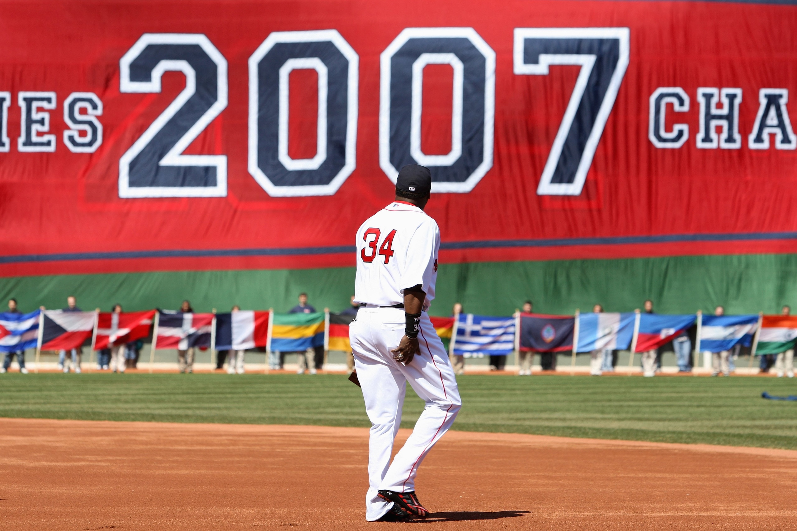 BOSTON - APRIL 08: David Ortiz #34 of the Boston Red Sox heads out on to the field to get his 2007 World Series Championship ring before the game the Detroit Tigers on April 8,2008 during Opening Day at Fenway Park in Boston, Massachusetts. (Photo by Elsa