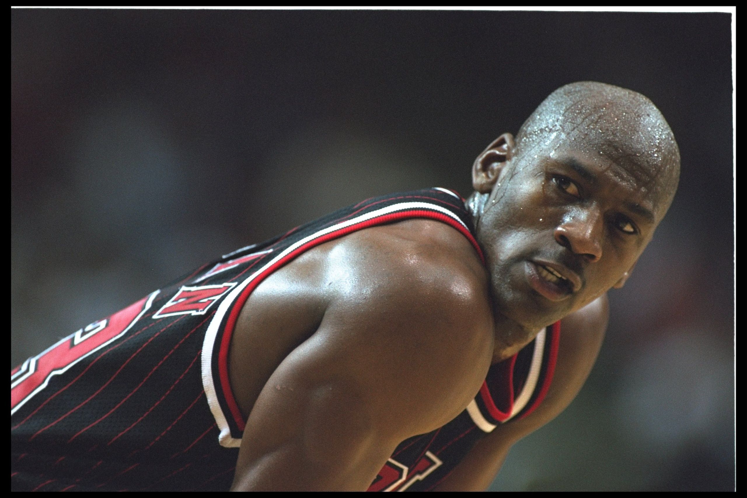 14 Nov 1995:  Guard Michael Jordan #23 of the Chicago Bulls pauses for a breather as a free throw is shot on the court at the Orlando Arena in Orlando, Florida, during the game against the Orlando Magic.  The Magic defeated the Bulls 94-88.  Mandatory Cre