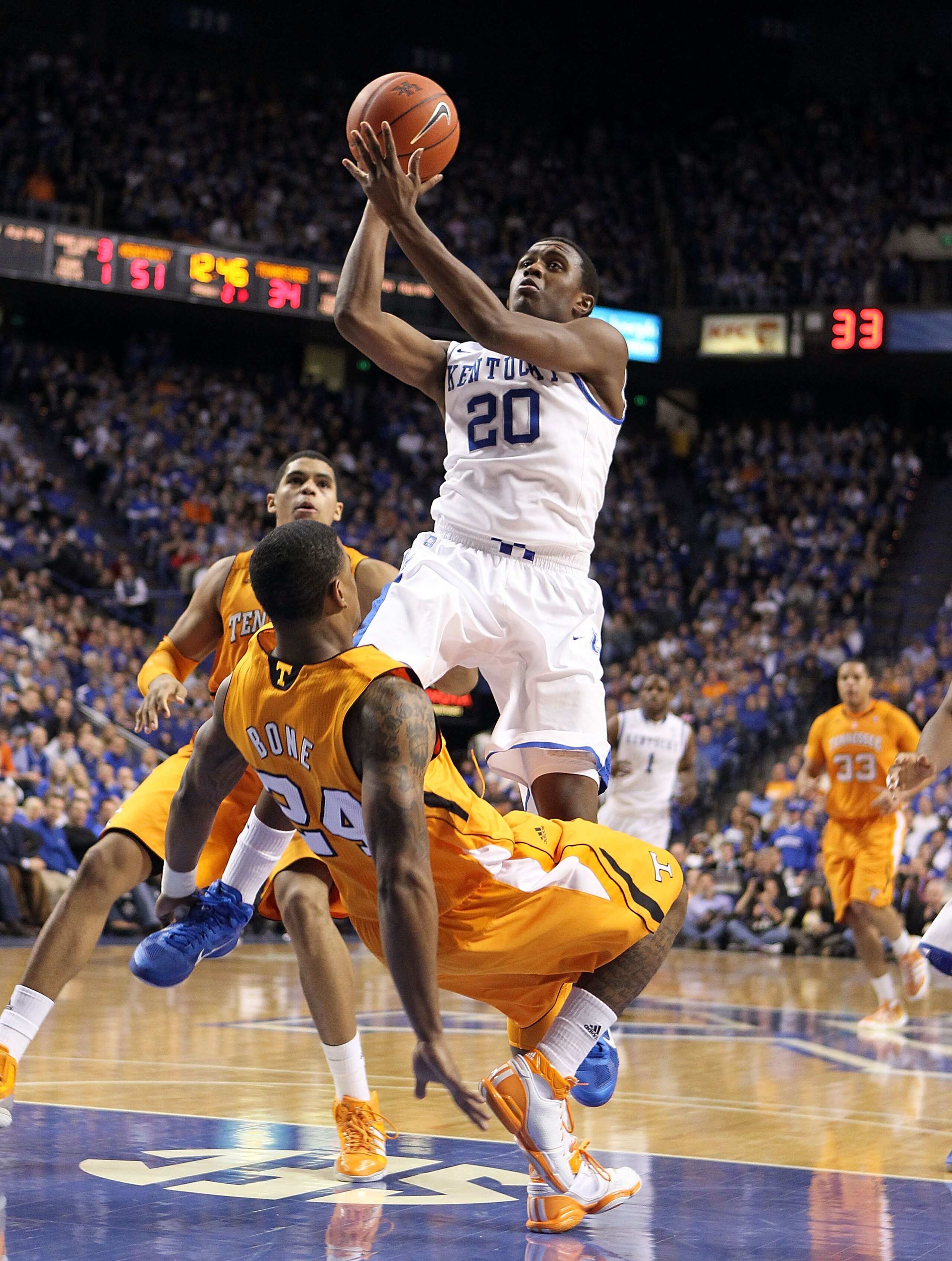 LEXINGTON, KY - FEBRUARY 08: Doron Lamb #20 of the Kentucky Wildcats shoots the ball while defended by Josh Bone #24 of the Tennessee Volunteers during the SEC game at Rupp Arena on February 8, 2011 in Lexington, Kentucky. Kentucky won 73-61. (Photo by An
