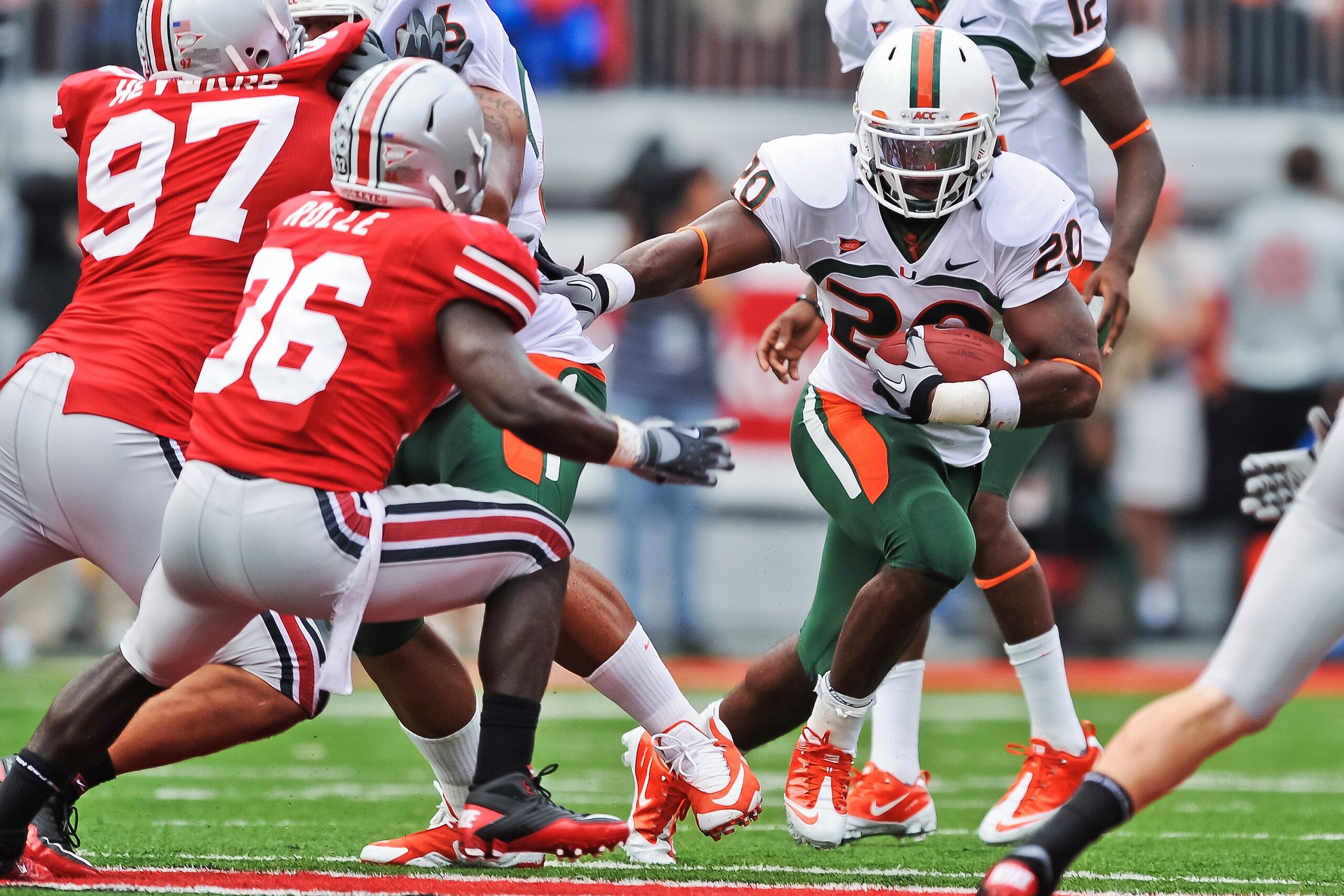 COLUMBUS, OH - SEPTEMBER 11:  Damien Berry #20 of the Miami Hurricanes runs with the ball against the Ohio State Buckeyes at Ohio Stadium on September 11, 2010 in Columbus, Ohio.  (Photo by Jamie Sabau/Getty Images)