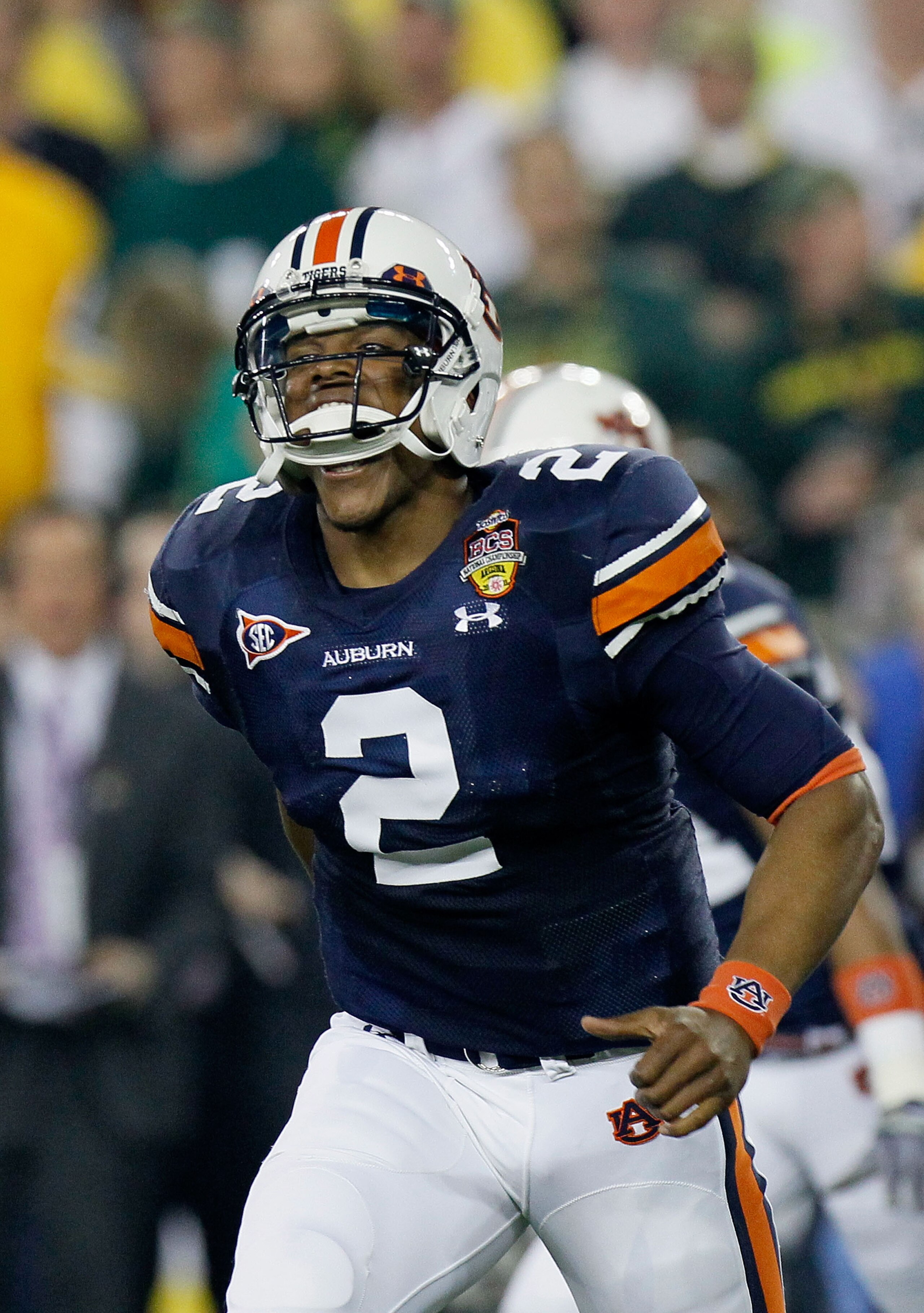 GLENDALE, AZ - JANUARY 10:  Cameron Newton #2 of the Auburn Tigers reacts during their game against the Oregon Ducks during the Tostitos BCS National Championship Game at University of Phoenix Stadium on January 10, 2011 in Glendale, Arizona.  (Photo by K