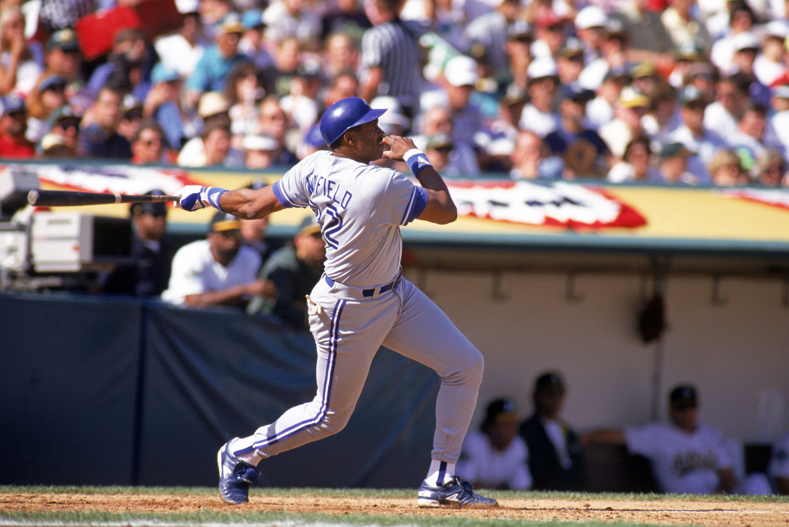 OAKLAND, CA - OCTOBER 10:  Outfielder Dave Winfield #32 of the Toronto Blue Jays swings during game 5 of the American League Championship Series against the Oakland A's on October 12, 1992 at Oakland Alameda County Stadium in Oakland, California.  (Photo