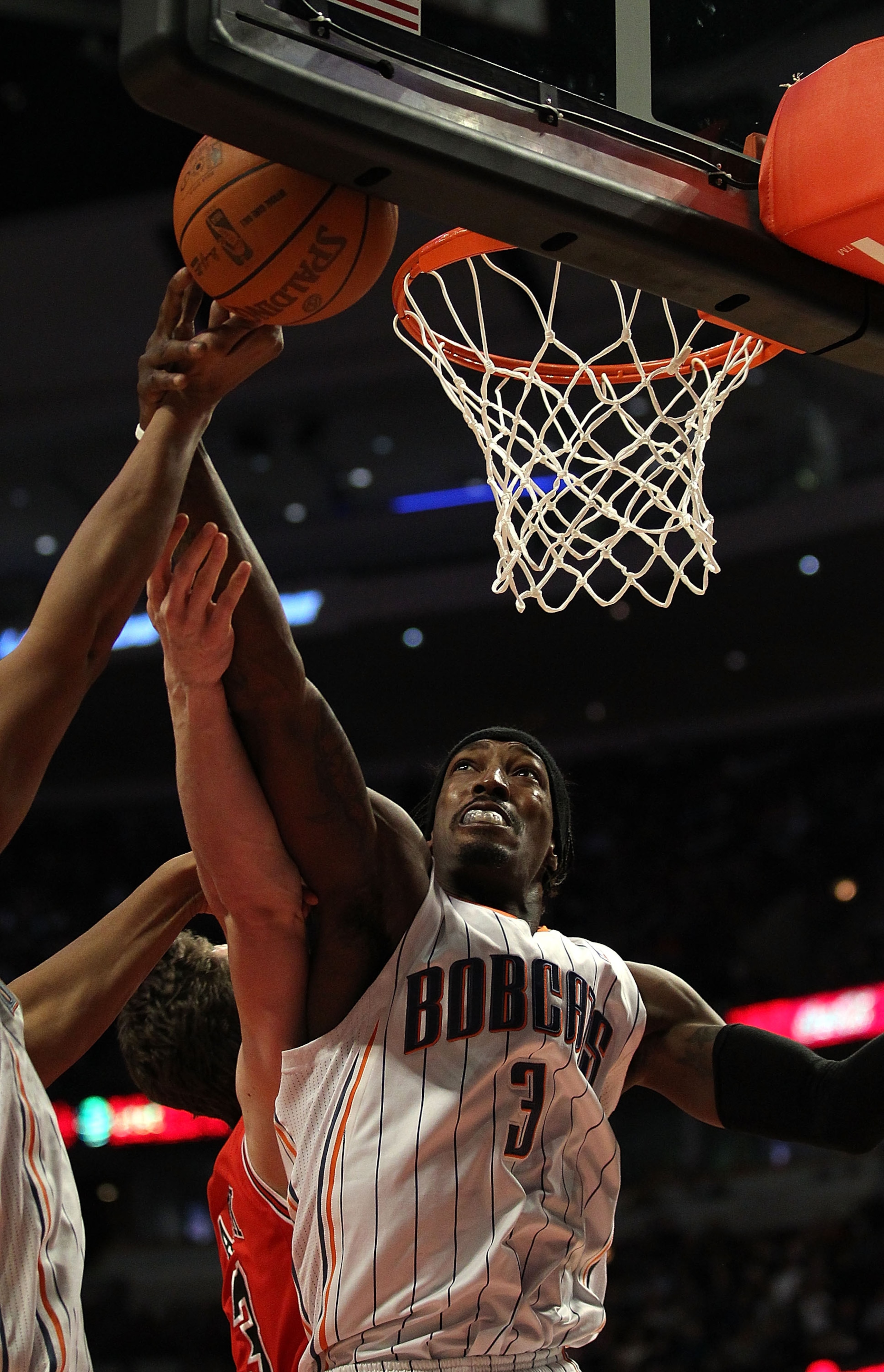 CHICAGO, IL - FEBRUARY 15: Gerald Wallace #3 of the Charlotte Bobcats tries for a rebound against the Chicago Bulls at the United Center on February 15, 2011 in Chicago, Illinois. The Bulls defeated the Bobcats 106-94. NOTE TO USER: User expressly acknowl