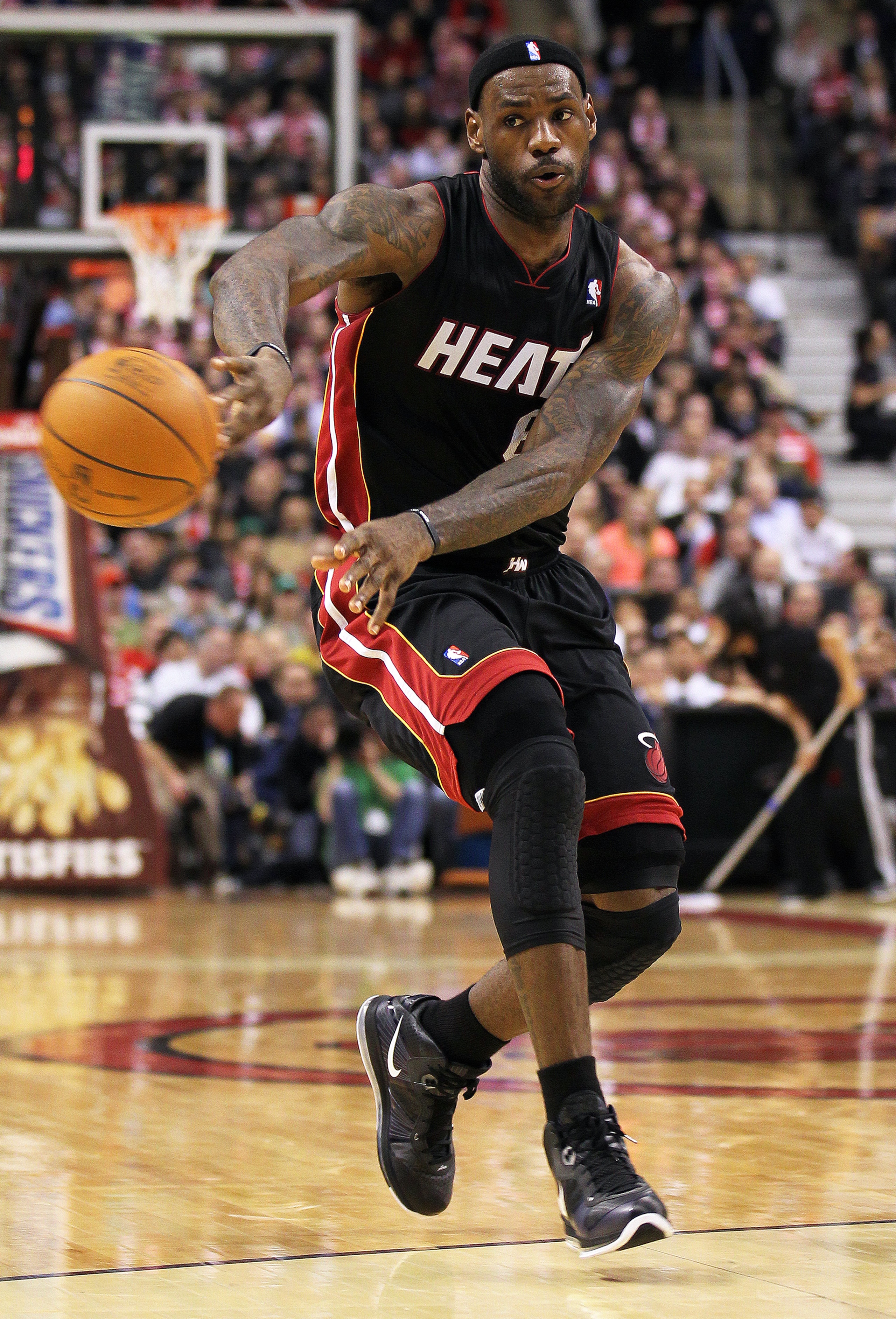 TORONTO, CAN - FEBRUARY 16:  LeBron James #6 of the Miami Heat passes the ball off in a game against the Toronto Raptors on February 16, 2011 at the Air Canada Centre in Toronto, Canada. (Photo by Claus Andersen/Getty Images)