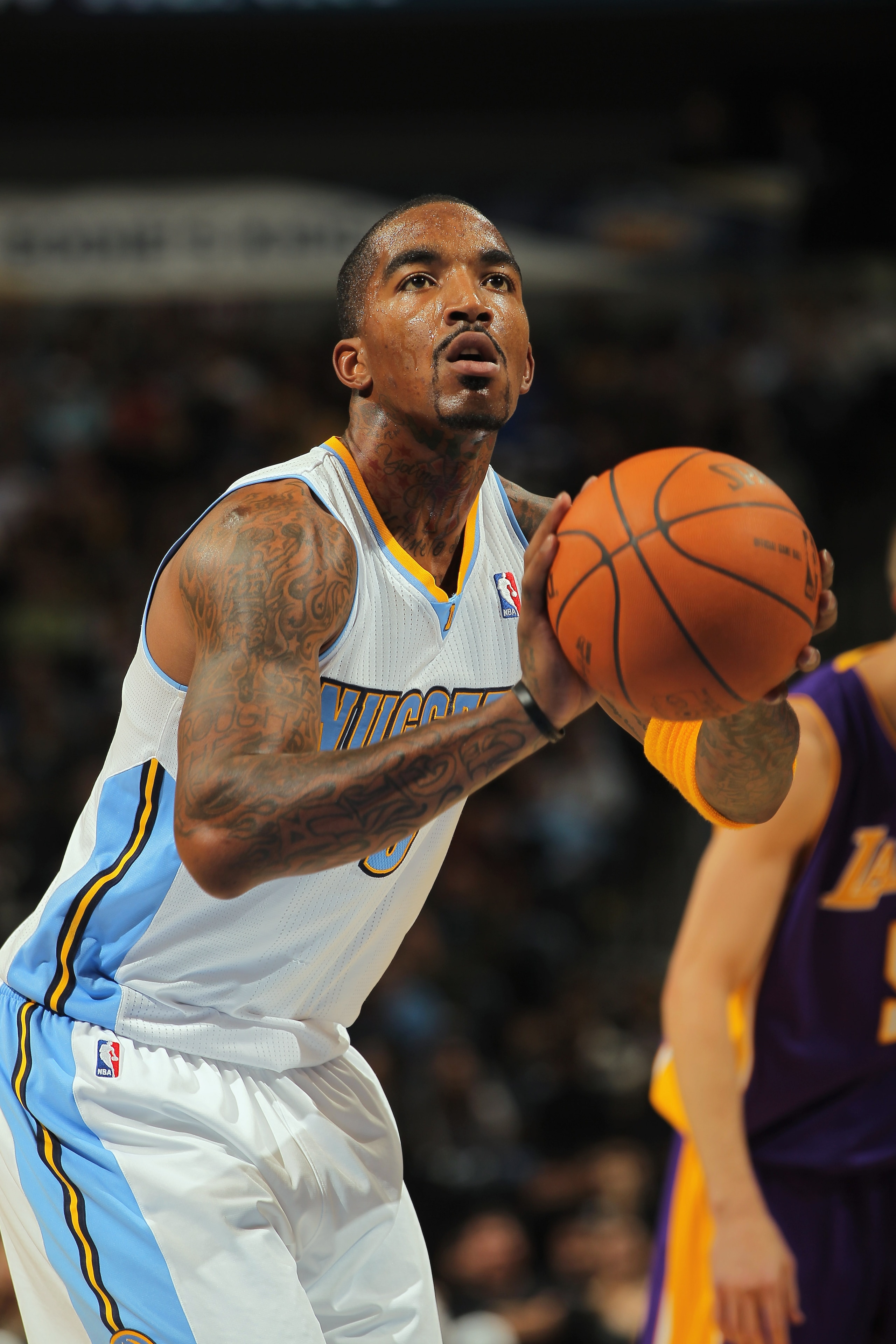 DENVER - NOVEMBER 11:  J.R. Smith #5 of the Denver Nuggets takes a free throw against the Los Angeles Lakers at the Pepsi Center on November 11, 2010 in Denver, Colorado. The Nuggets defeated the Lakers 118-112.  NOTE TO USER: User expressly acknowledges 