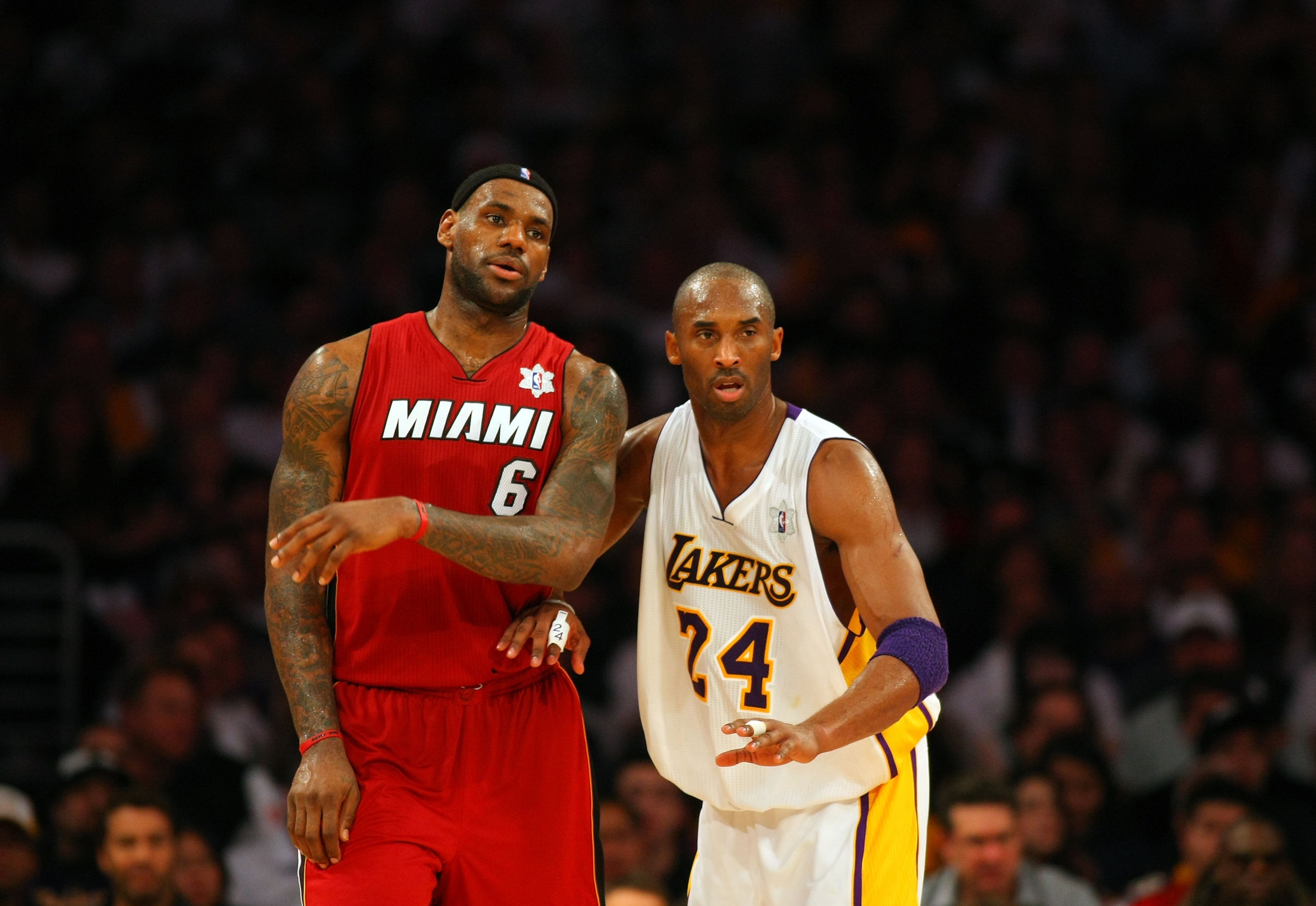 LOS ANGELES, CA - DECEMBER 25: Kobe Bryant #24 of the Los Angeles Lakers defends LeBron James #6 of the Miami Heat during the NBA game at Staples Center on December 25, 2010 in Los Angeles, California. The Heat defeated the Lakers 96-80. NOTE TO USER: U LOS ANGELES, CA - DECEMBER 25: Kobe Bryant #24 of the Los Angeles Lakers defends LeBron James #6 of the Miami Heat during the NBA game at Staples Center on December 25, 2010 in Los Angeles, California. The Heat defeated the Lakers 96-80. NOTE TO USER: U