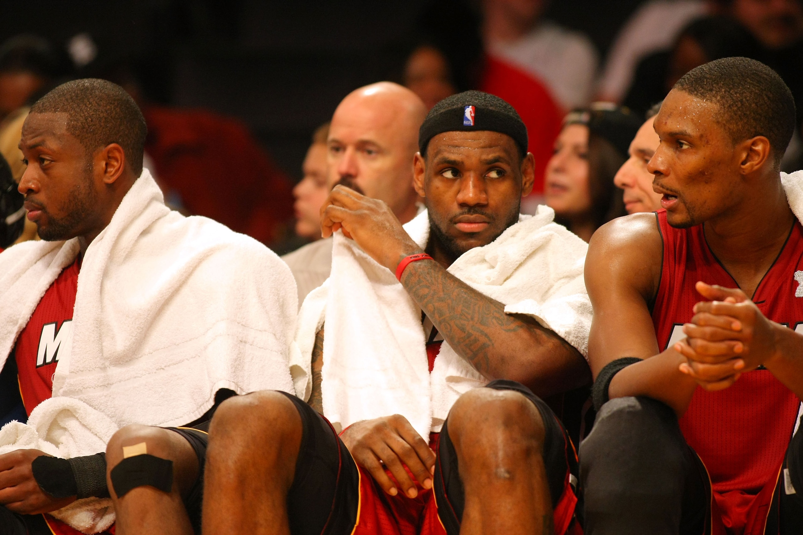 LOS ANGELES, CA - DECEMBER 25: (L-R) Dwyane Wade #3, LeBron James #6 and Chris Bosh #11 of the Miami Heat look on from the bench area during the NBA game against the Los Angeles Lakers at Staples Center on December 25, 2010 in Los Angeles, California. Th LOS ANGELES, CA - DECEMBER 25: (L-R) Dwyane Wade #3, LeBron James #6 and Chris Bosh #11 of the Miami Heat look on from the bench area during the NBA game against the Los Angeles Lakers at Staples Center on December 25, 2010 in Los Angeles, California. Th