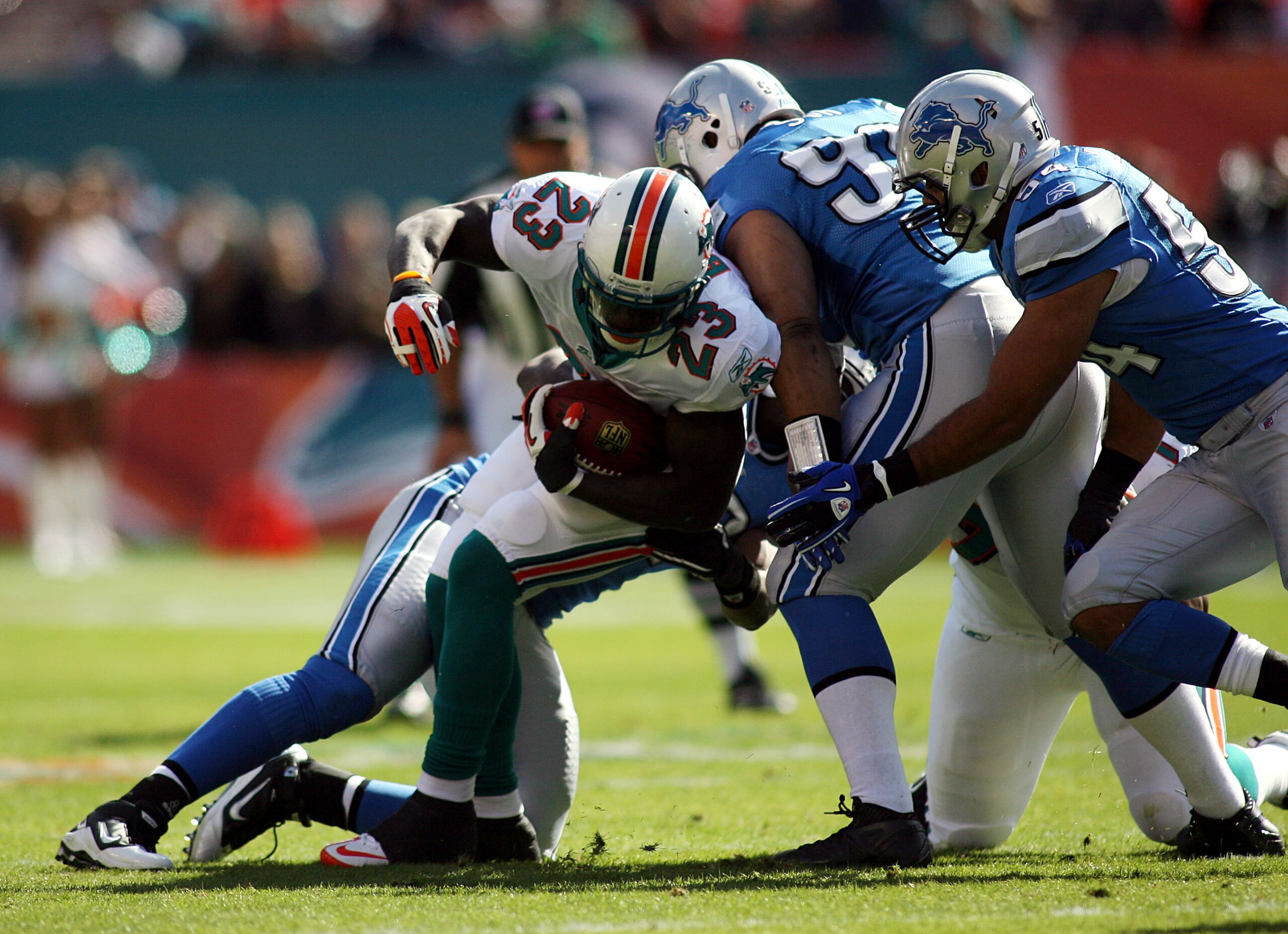 MIAMI - DECEMBER 26:  Running back Ronnie brown #23 of the Miami Dolphins is stopped by the Detroit Lions at Sun Life Stadium on December 26, 2010 in Miami, Florida. The Lions defeated the Dolphins 34-27.  (Photo by Marc Serota/Getty Images)