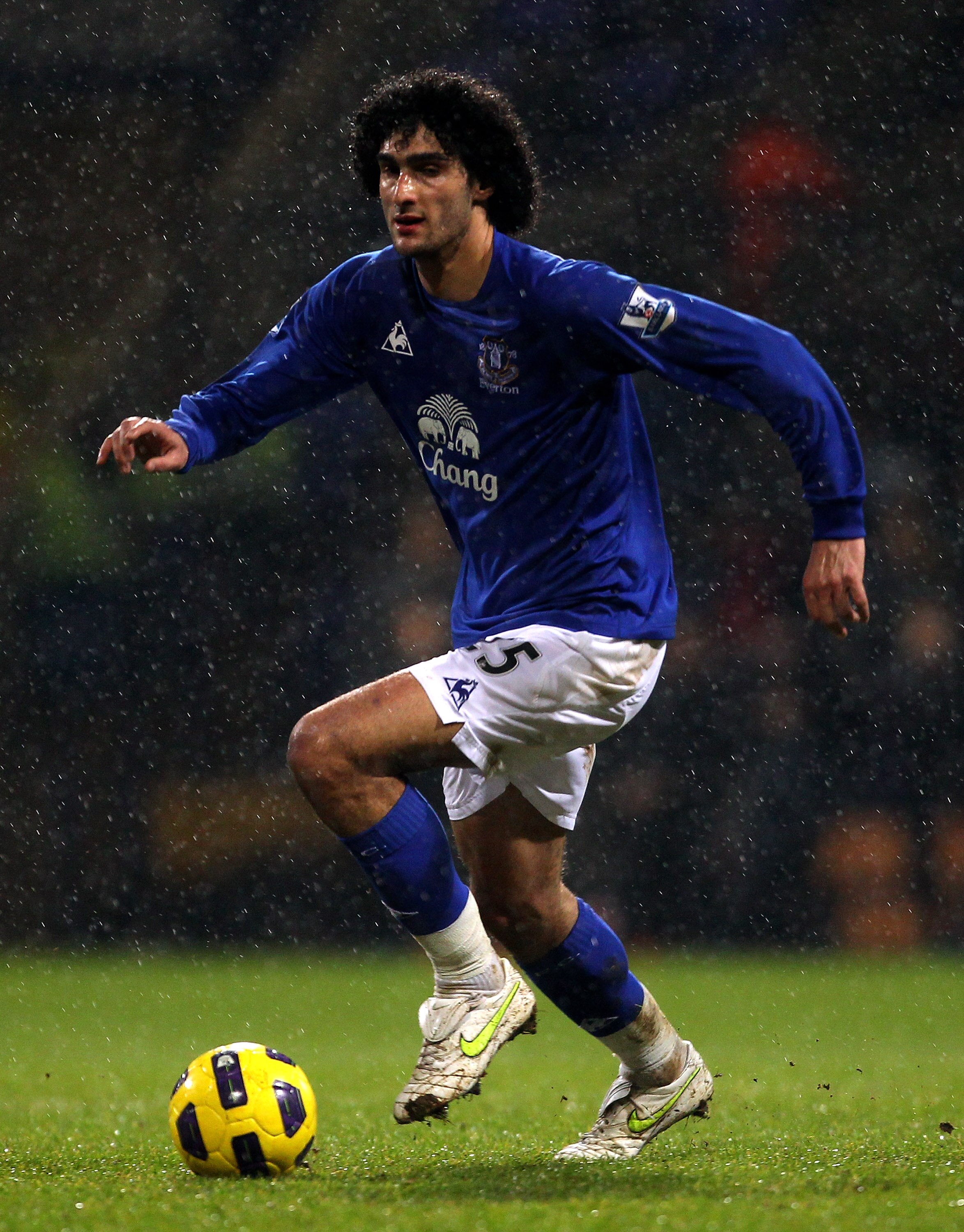 BOLTON, ENGLAND - FEBRUARY 13:  Marouane Fellaini of Everton in action during the Barclays Premier League match between Bolton Wanderers and Everton at the Reebok Stadium on February 13, 2011 in Bolton, England.  (Photo by Alex Livesey/Getty Images)