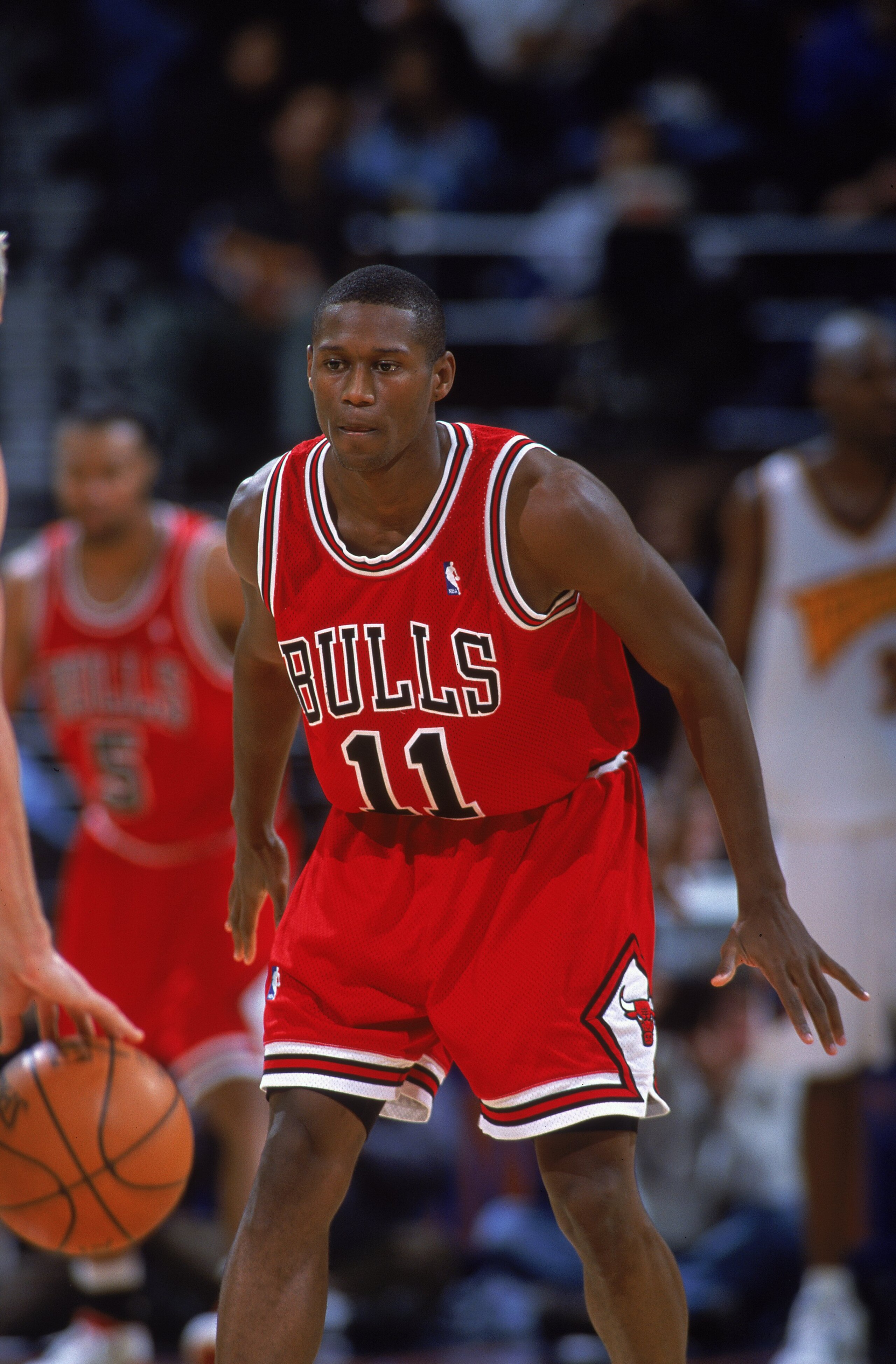 21 Nov 2000:  A.J. Guyton #11 of the Chicago Bulls drops back into position during the game against the Golden State Warriors at the Network Associates Stadium in Oakland, California. The Warriors defeated the Bulls 89-74.   NOTE TO USER: It is expressly