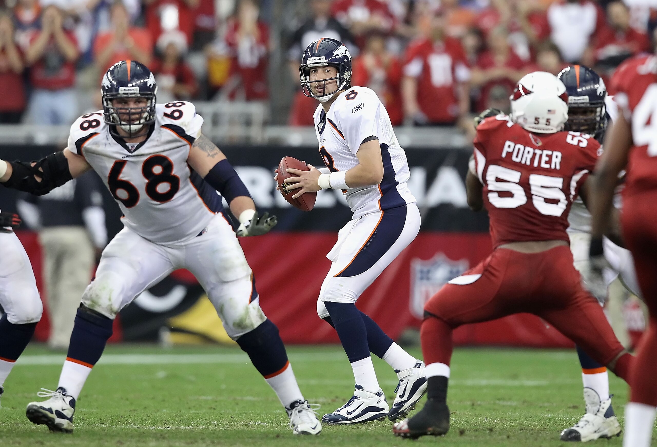 GLENDALE, AZ - DECEMBER 12: Quarterback Kyle Orton #8 of the Denver Broncos drops back to pass during the NFL game against the Arizona Cardinals at the University of Phoenix Stadium on December 12, 2010 in Glendale, Arizona. The Cardinals defeated the B GLENDALE, AZ - DECEMBER 12: Quarterback Kyle Orton #8 of the Denver Broncos drops back to pass during the NFL game against the Arizona Cardinals at the University of Phoenix Stadium on December 12, 2010 in Glendale, Arizona. The Cardinals defeated the B