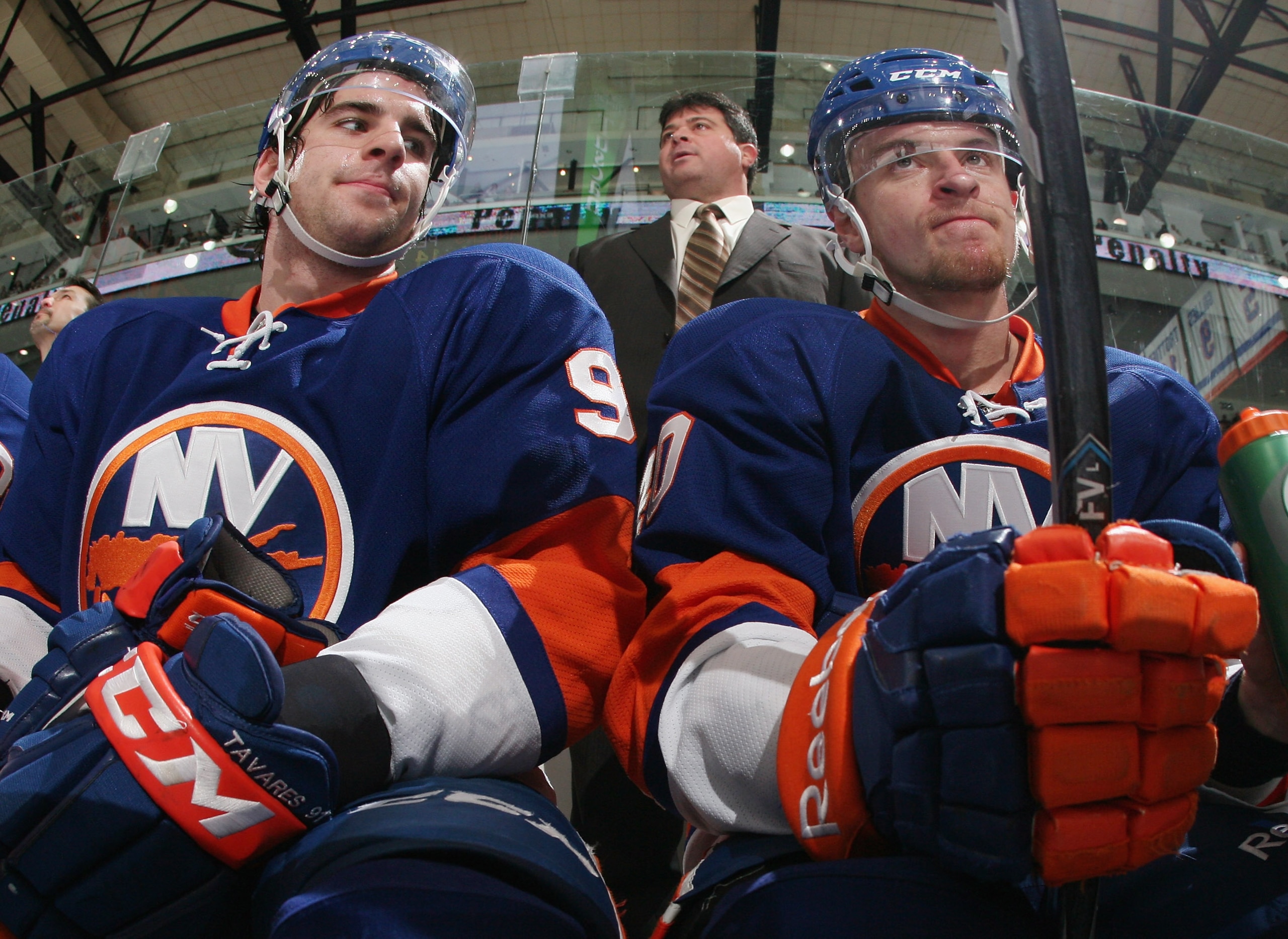 UNIONDALE, NY - DECEMBER 29: (L-R) John Tavares #91 and Michael Grabner #40 of the New York Islanders sit on the bench as head coach Jack Capuano watches the action against the Pittsburgh Penguins at the Nassau Coliseum on December 29, 2010 in Uniondale, UNIONDALE, NY - DECEMBER 29: (L-R) John Tavares #91 and Michael Grabner #40 of the New York Islanders sit on the bench as head coach Jack Capuano watches the action against the Pittsburgh Penguins at the Nassau Coliseum on December 29, 2010 in Uniondale,