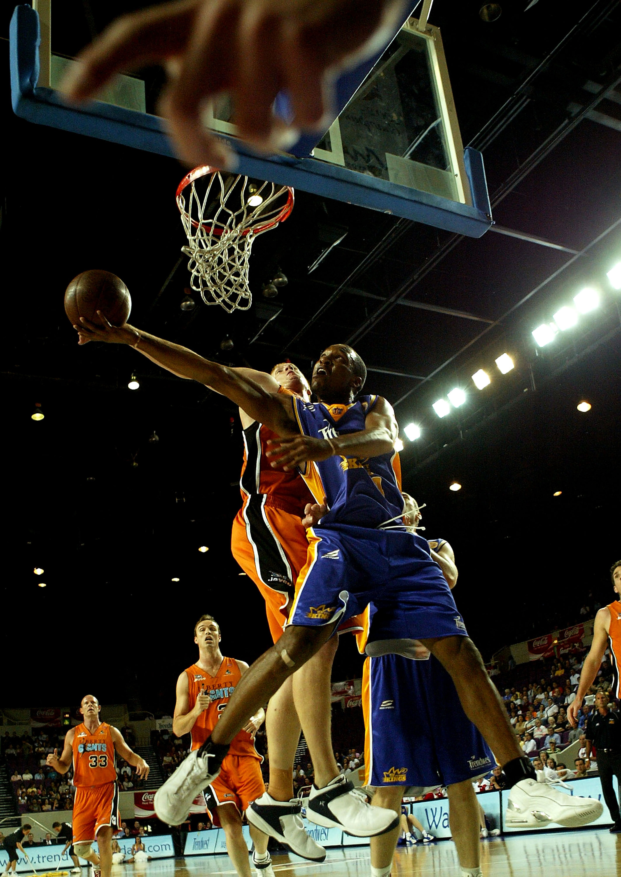 SYDNEY, AUSTRALIA - FEBRUARY 18: Chris Carrawell #8 of the Kings in action during the round 21 NBL match between the Sydney Kings and the Victoria Giants at the Sydney Entertainment Centre February 18, 2004 in Sydney, Australia.  (Photo by Nick Laham/Gett