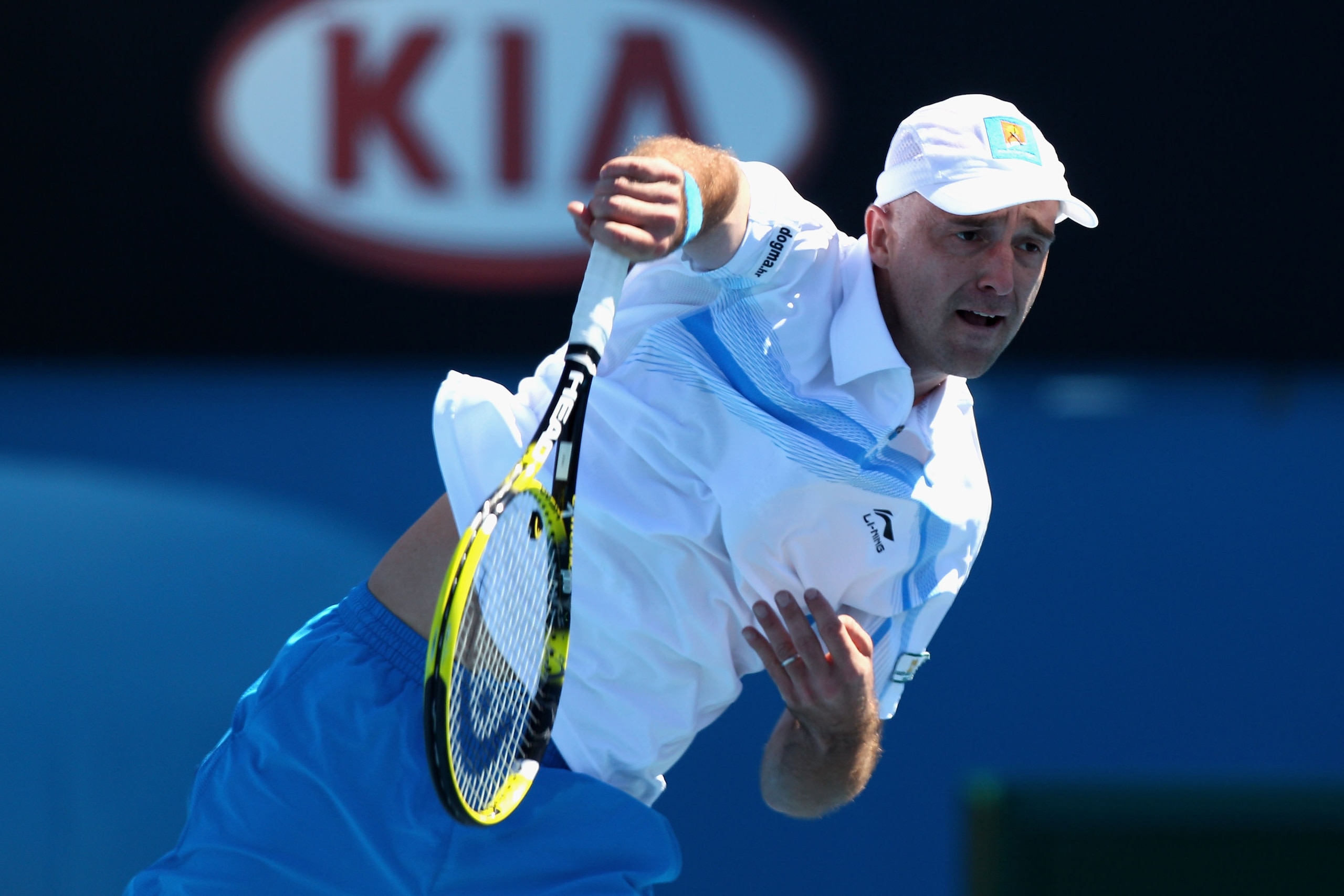 MELBOURNE, AUSTRALIA - JANUARY 19:  Ivan Ljubicic of Croatia serves during his second round match against Benoit Paire of France during day three of the 2011 Australian Open at Melbourne Park on January 19, 2011 in Melbourne, Australia.  (Photo by Ryan Pi