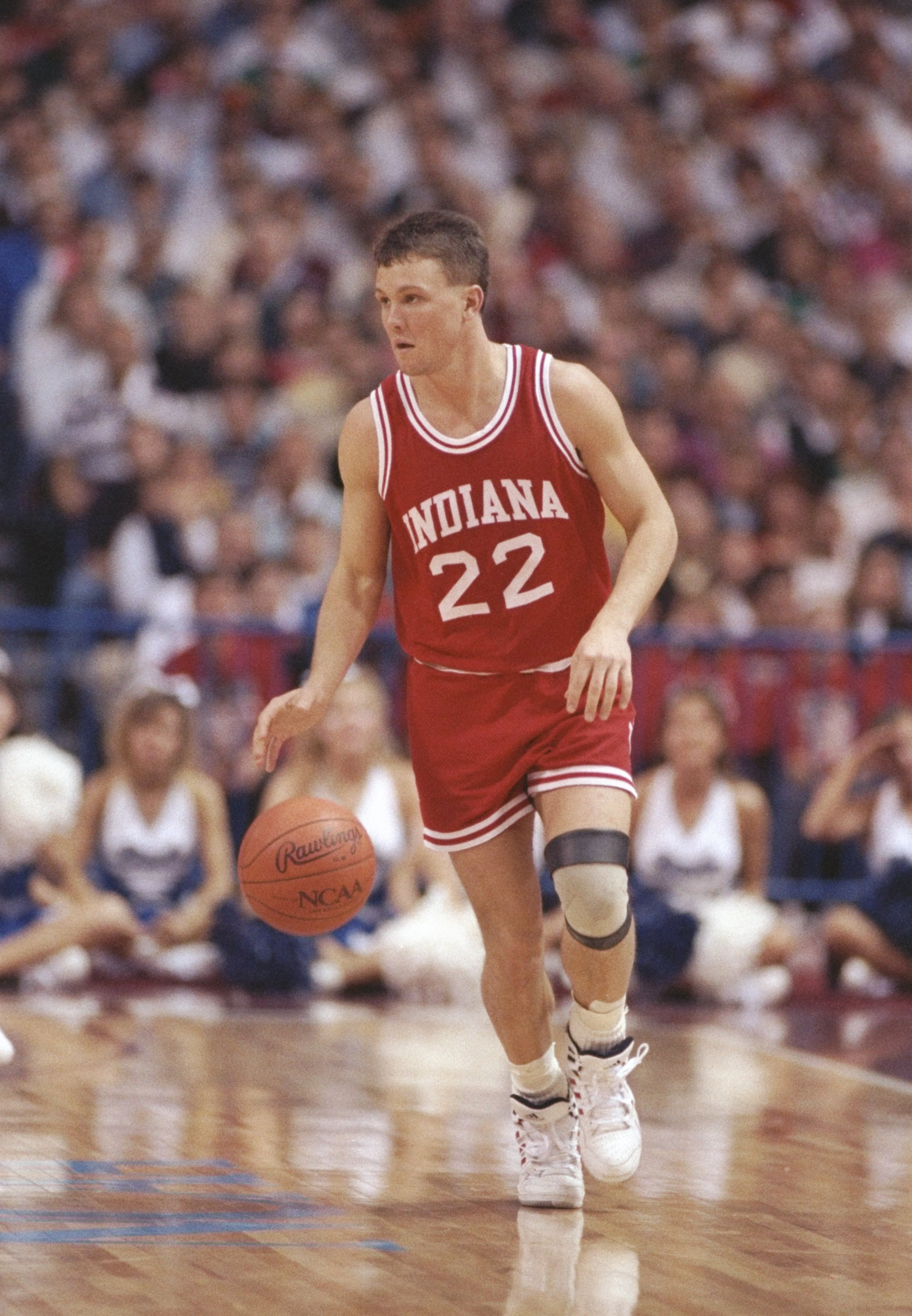 4 Apr 1992: Damon Bailey of the Indiana Hoosiers dribbles the ball down the court during a playoff game against the Duke Blue Devils at the Hubert H. Humphrey Metrodome in Minneaspolis, Minnesota. Duke won the game 81-78.