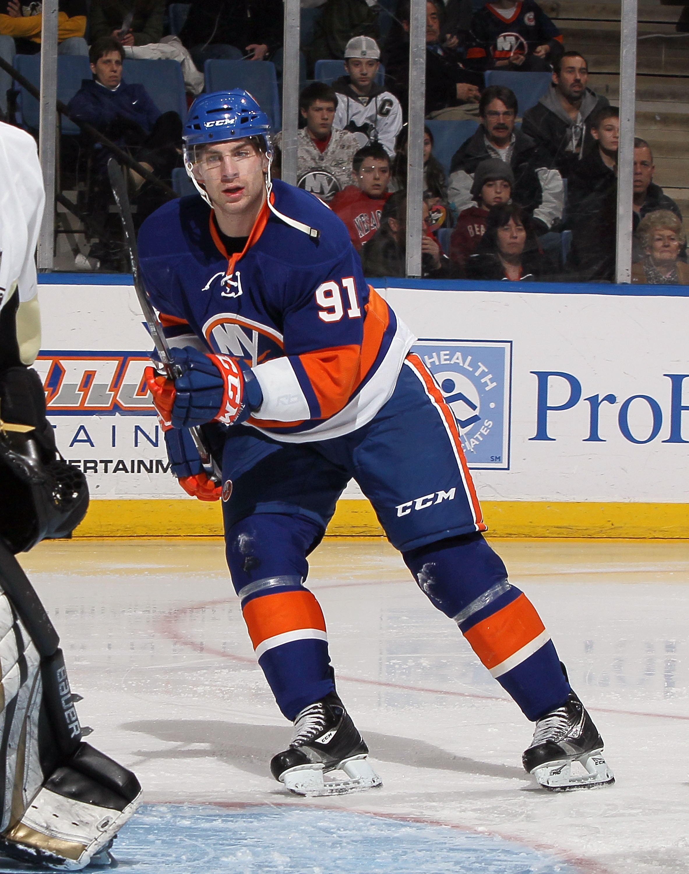 UNIONDALE, NY - FEBRUARY 11:  John Tavares #91 of the New York Islanders skates against the Pittsburgh Penguins on February 11, 2011 at Nassau Coliseum in Uniondale, New York. The Isles defeated the Pens 9-3.  (Photo by Jim McIsaac/Getty Images)