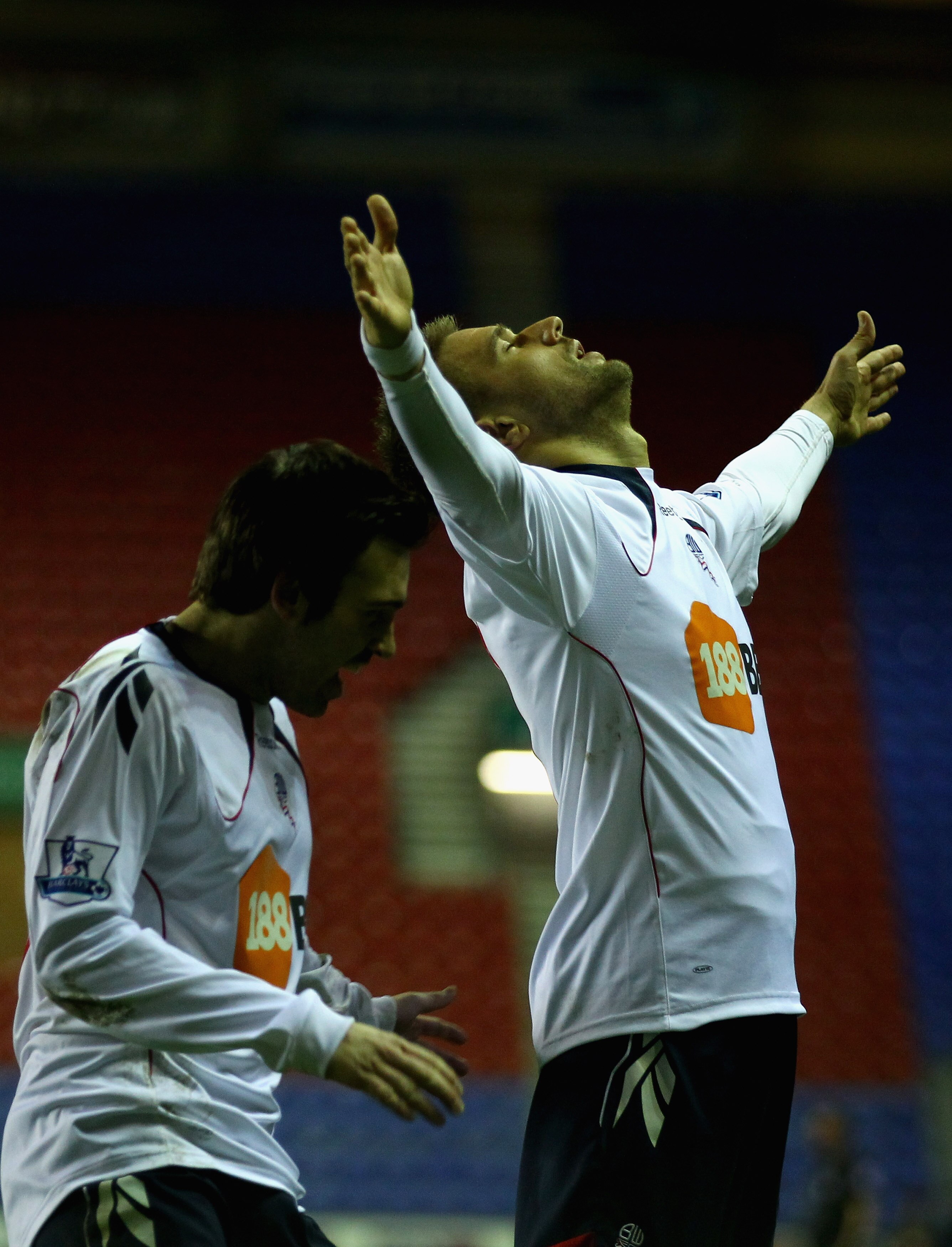 WIGAN, ENGLAND - FEBRUARY 16:  Ivan Klasnic of Bolton Wanderers celebrates with Mark Davies after scoring the first goal during the F.A Cup sponsored by E.ON 4th round replay match between Wigan Athletic and Bolton Wanderers at DW Stadium on February 16,