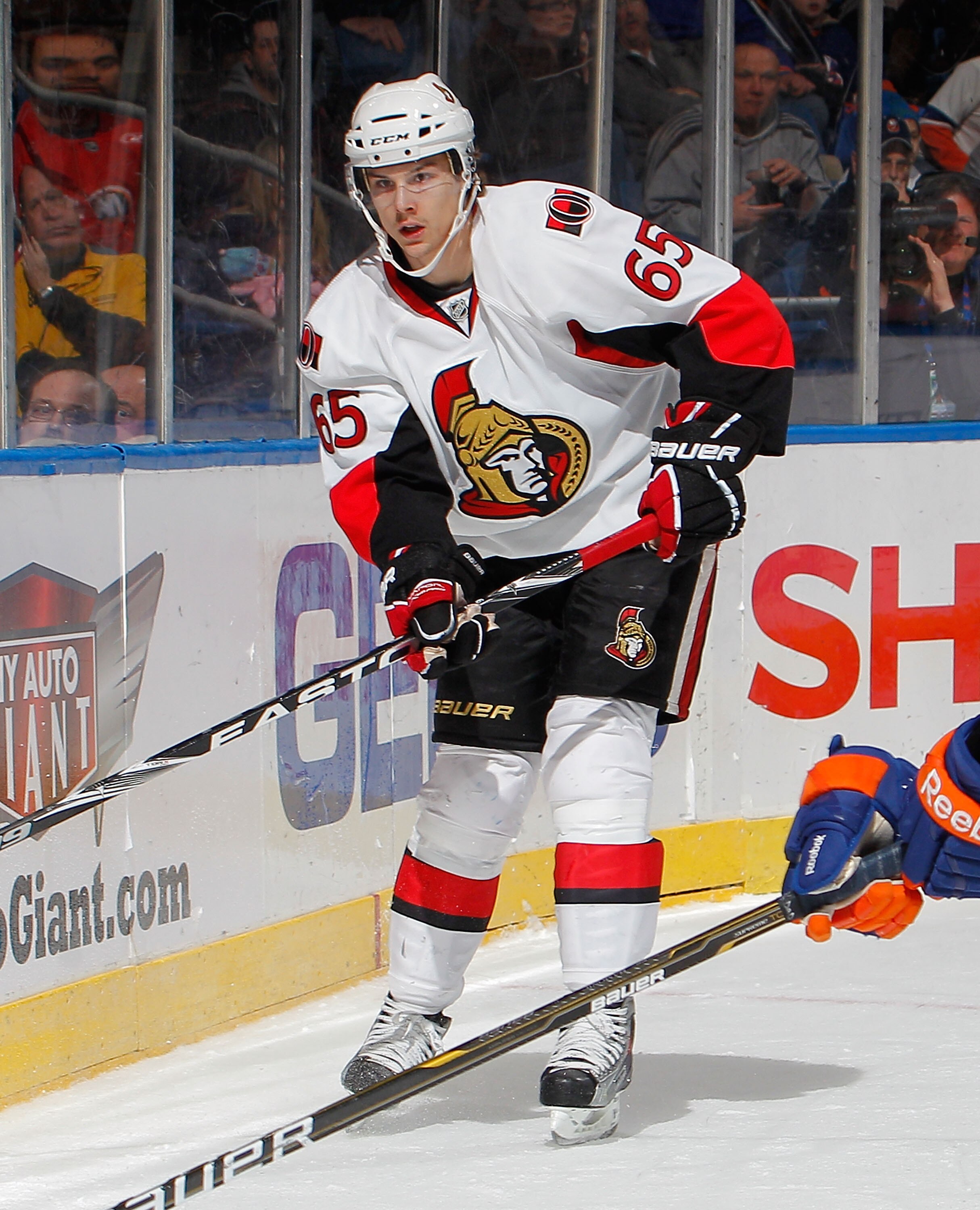 UNIONDALE, NY - FEBRUARY 05:  Erik Karlsson #65 of the Ottawa Senators skates during an NHL hockey game against the New York Islanders at Nassau Coliseum on February 5, 2011 in Uniondale, New York.  (Photo by Paul Bereswill/Getty Images)