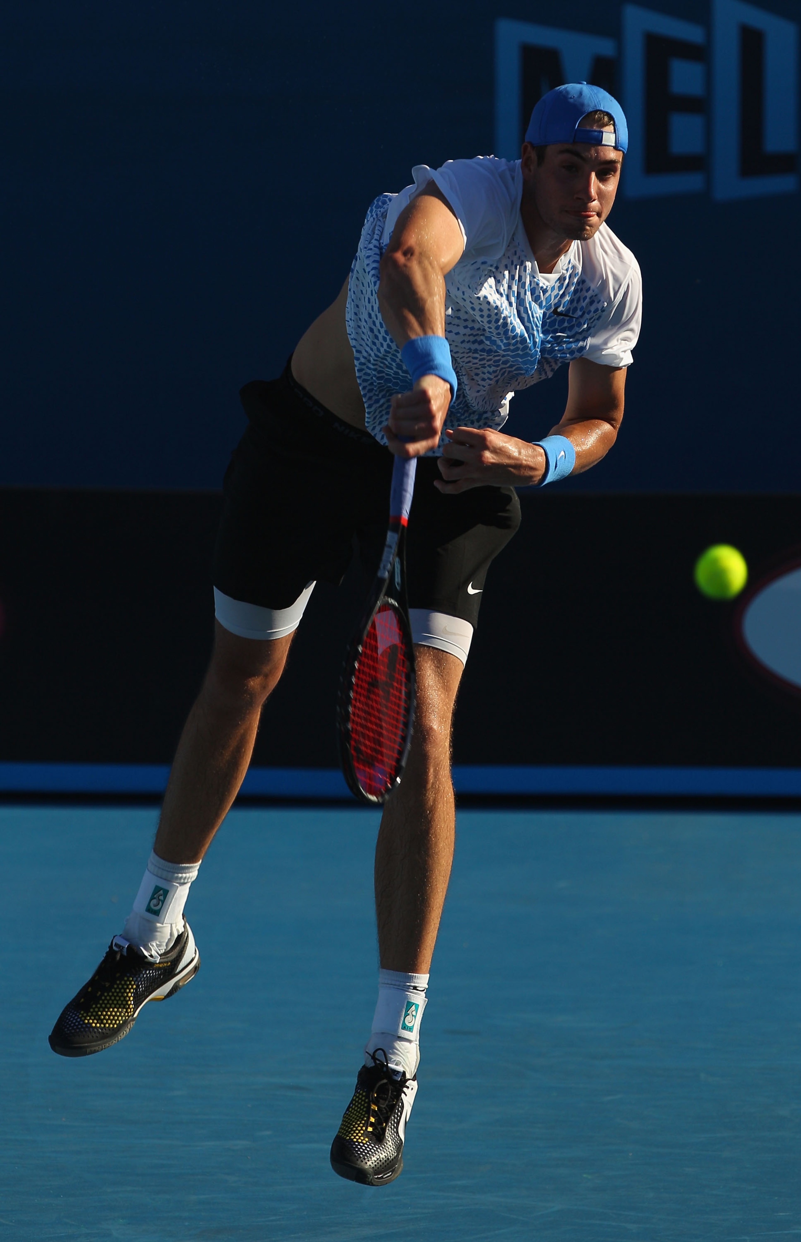 MELBOURNE, AUSTRALIA - JANUARY 20:  John Isner of United States of America serves in his second round match against Radek Stepanek of Czech Republic during day four of the 2011 Australian Open at Melbourne Park on January 20, 2011 in Melbourne, Australia.