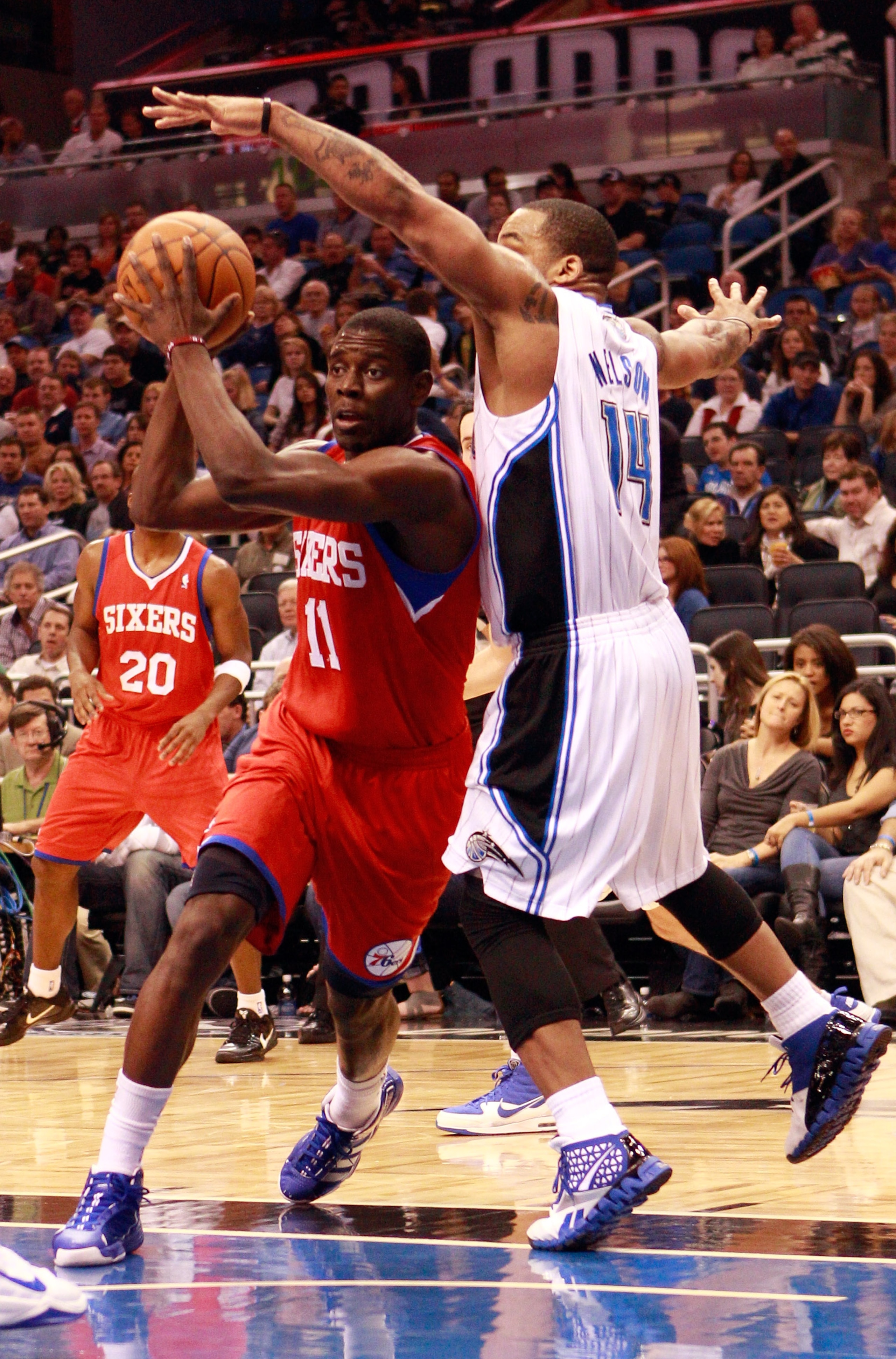 ORLANDO, FL - DECEMBER 18: Jrue Holiday #11 of the Philadelphia 76ers drives against Jameer Nelson #14 of the Orlando Magic during the game at Amway Arena on December 18, 2010 in Orlando, Florida. NOTE TO USER: User expressly acknowledges and agrees tha ORLANDO, FL - DECEMBER 18: Jrue Holiday #11 of the Philadelphia 76ers drives against Jameer Nelson #14 of the Orlando Magic during the game at Amway Arena on December 18, 2010 in Orlando, Florida. NOTE TO USER: User expressly acknowledges and agrees tha