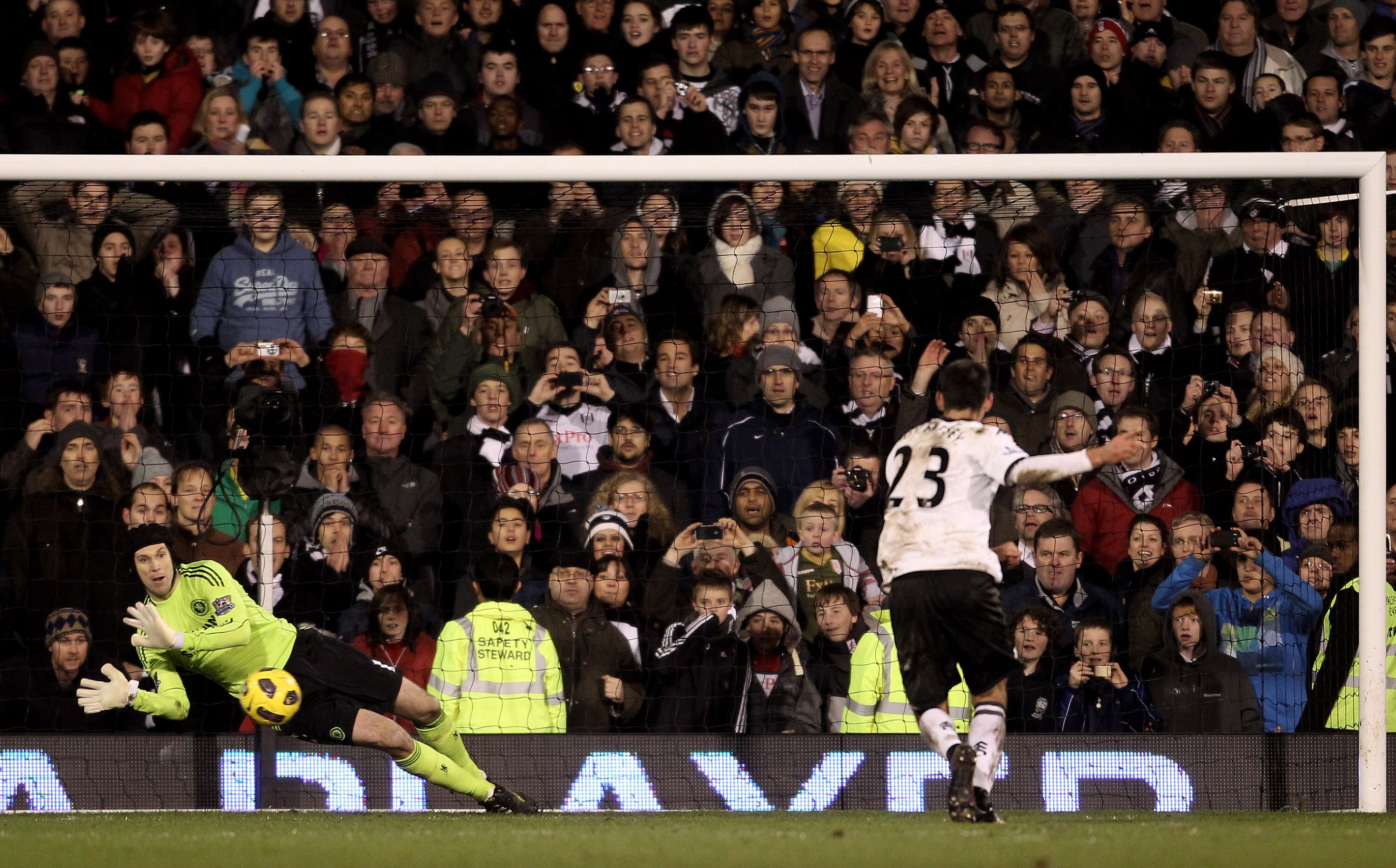 LONDON, ENGLAND - FEBRUARY 14: Petr Cech of Chelsea saves a penalty from Clint Dempsey of Fulham during the Barclays Premier League match between Fulham and Chelsea at Craven Cottage on February 14, 2011 in London, England.  (Photo by Scott Heavey/Getty I
