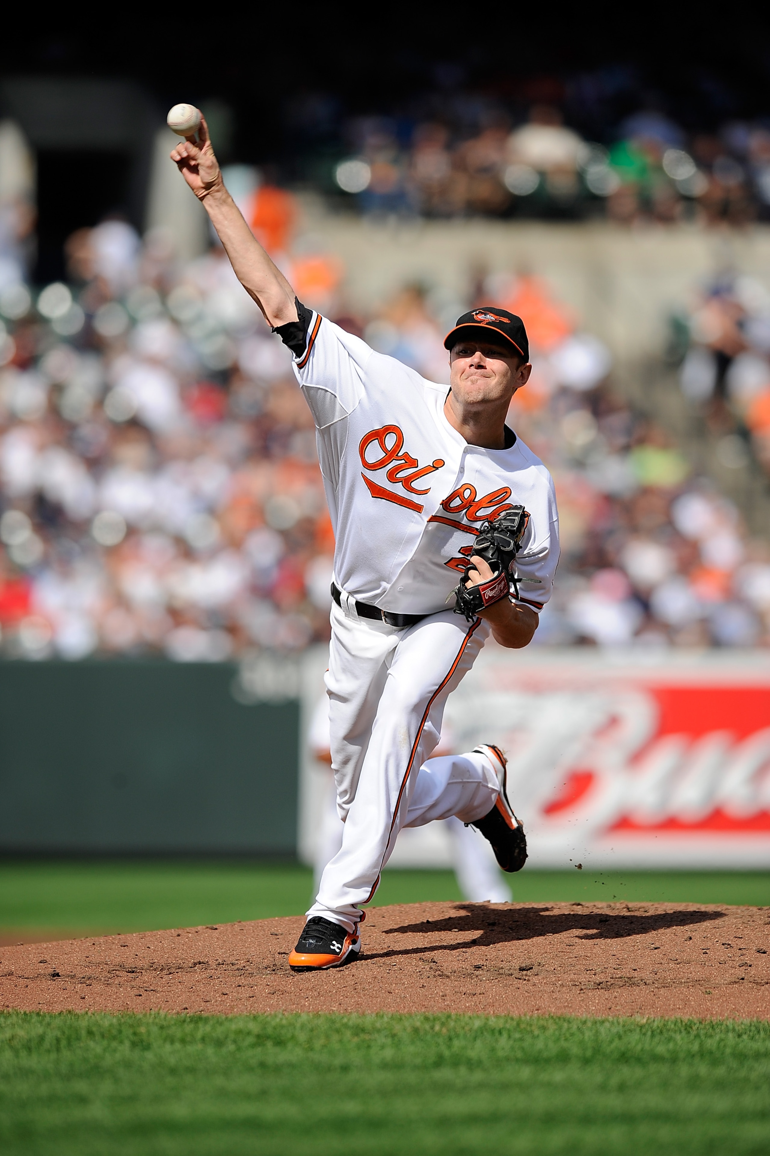 BALTIMORE - SEPTEMBER 19:  Chris Tillman #24 of the Baltimore Orioles pitches against the New York Yankees at Camden Yards on September 19, 2010 in Baltimore, Maryland.  (Photo by Greg Fiume/Getty Images)