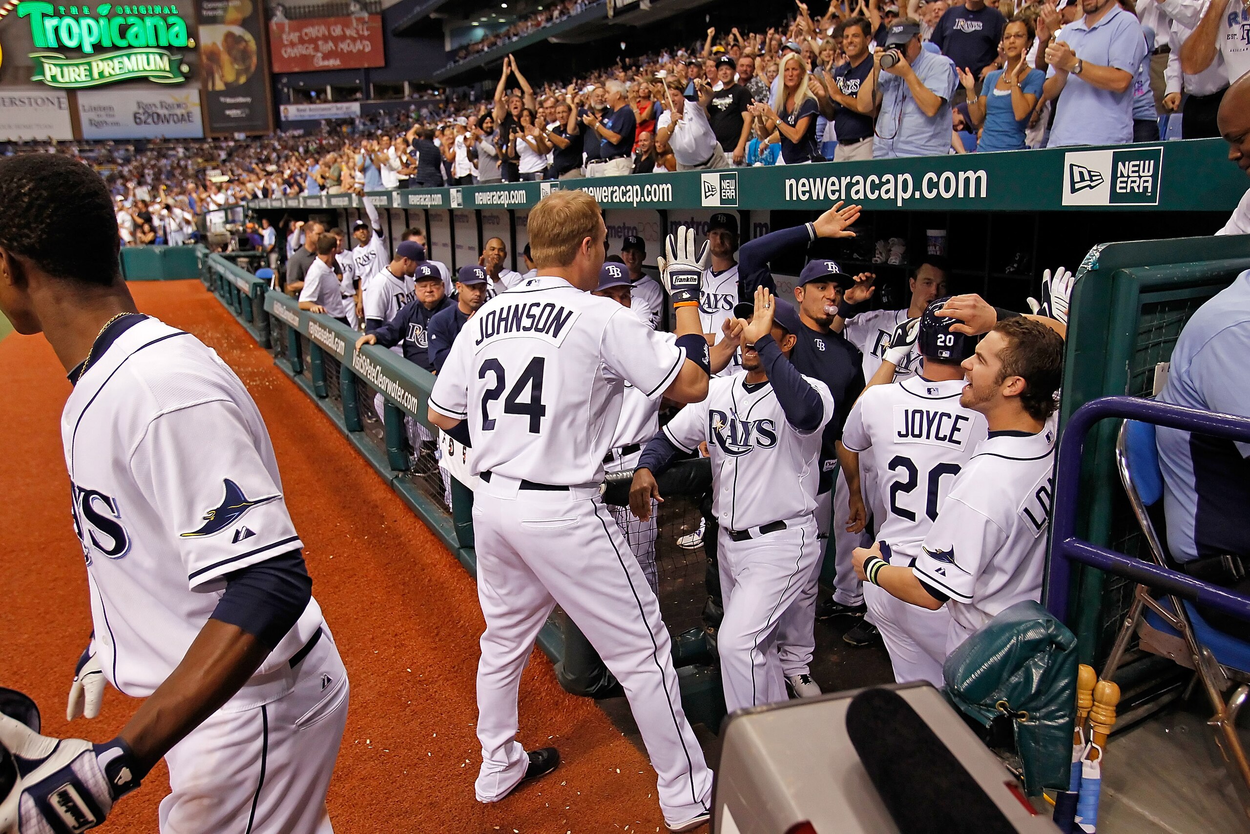 ST. PETERSBURG, FL - SEPTEMBER 15:  Designated hitter Dan Johnson #24 of the Tampa Bay Rays celebrates his two run home run in the seventh inning against the New York Yankees during the game at Tropicana Field on September 15, 2010 in St. Petersburg, Flor
