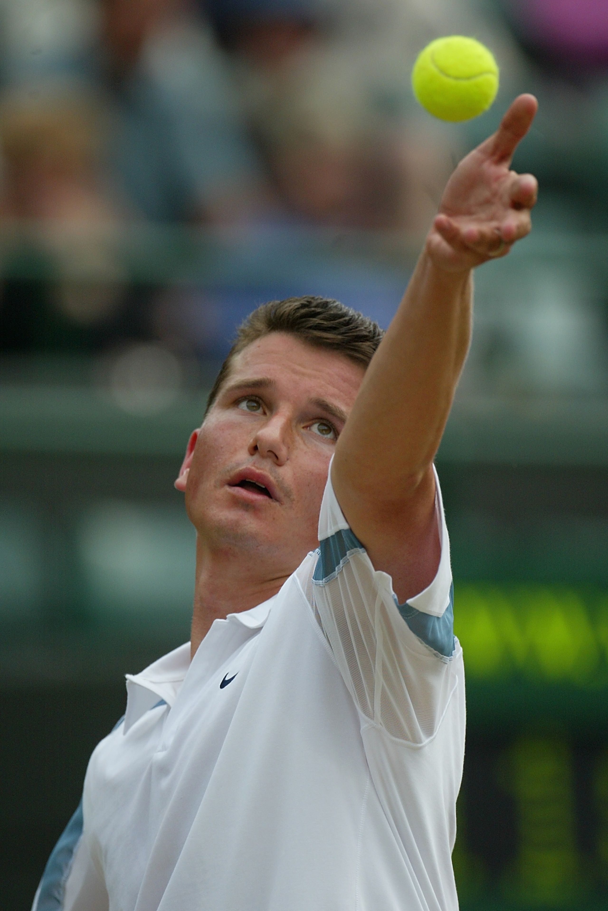 WIMBLEDON - July 4:  Richard Krajicek of the Netherlands in action against Xavier Malisse of Belgium during the mens quarter final match at the All England Tennis Championships at the All England Lawn Tennis Club, Wimbledon, England, on July 4, 2002. (Pho