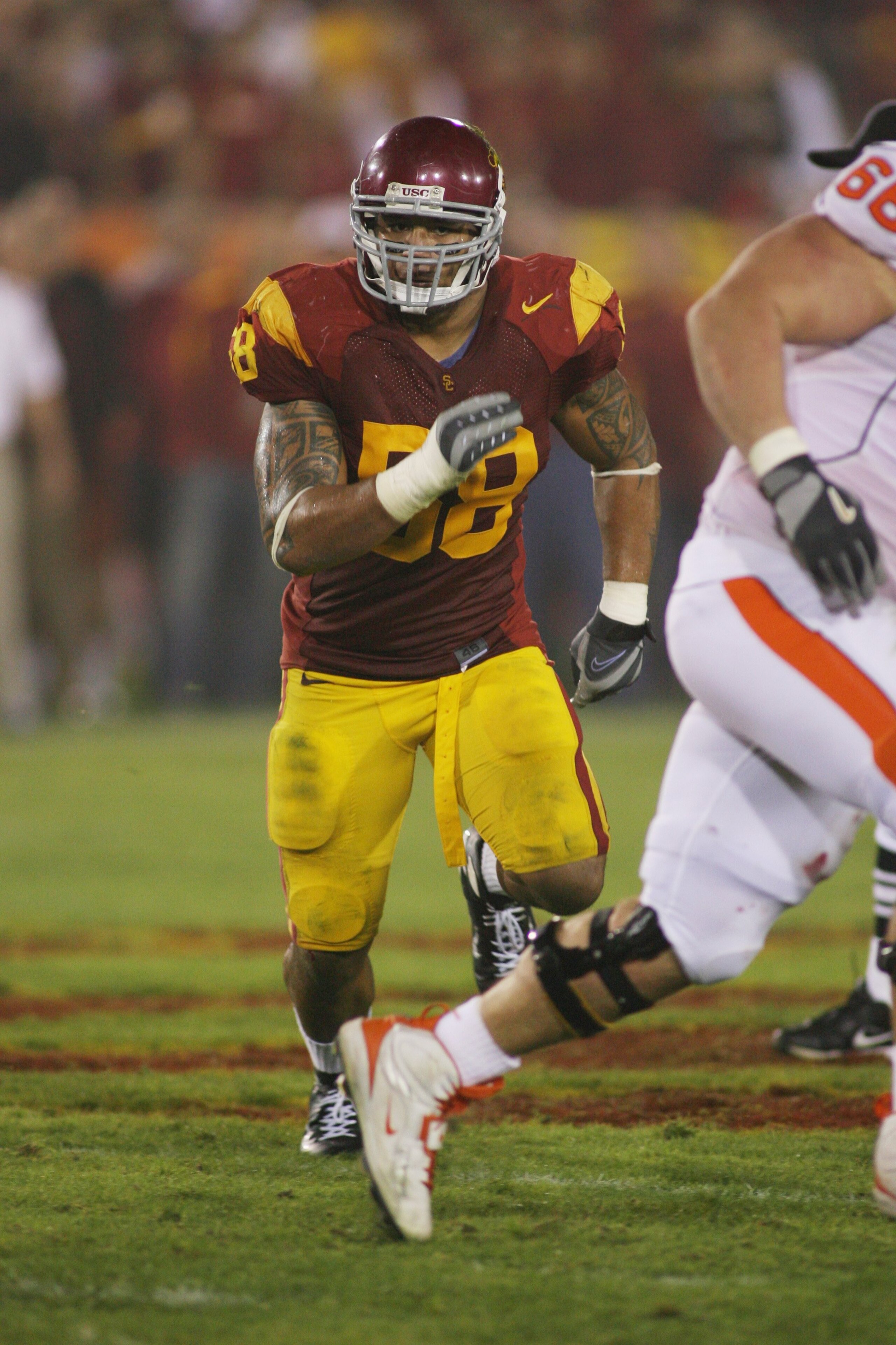 LOS ANGELES - NOVEMBER 3:  Rey Maualuga #58 of the USC Trojans pursues the play during the college football game against the Oregon State Beavers on November 3, 2007 at the Los Angeles Memorial Coliseum in Los Angeles, California.  USC defeated Oregon Sta