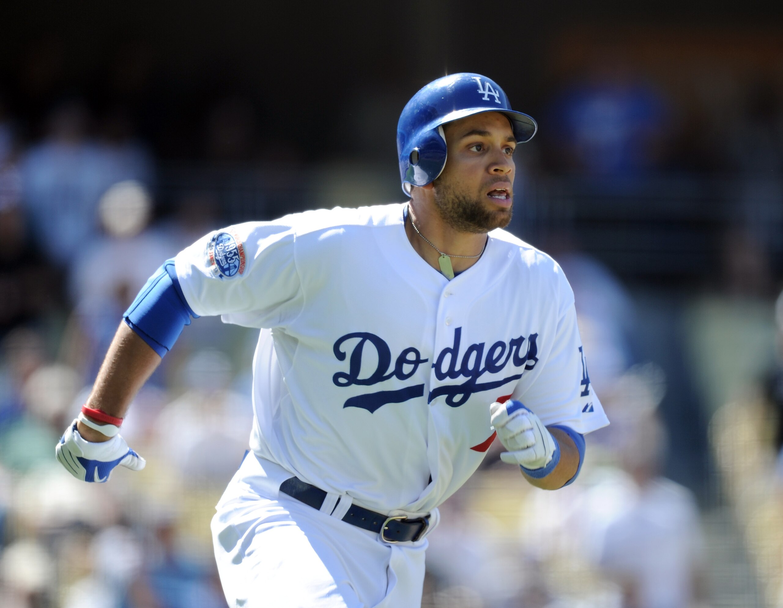 LOS ANGELES, CA - SEPTEMBER 01:  James Loney #7 of the Los Angeles Dodgers runs to first base against the Philadelphia Phillies at Dodger Stadium on September 1, 2010 in Los Angeles, California.  (Photo by Harry How/Getty Images)