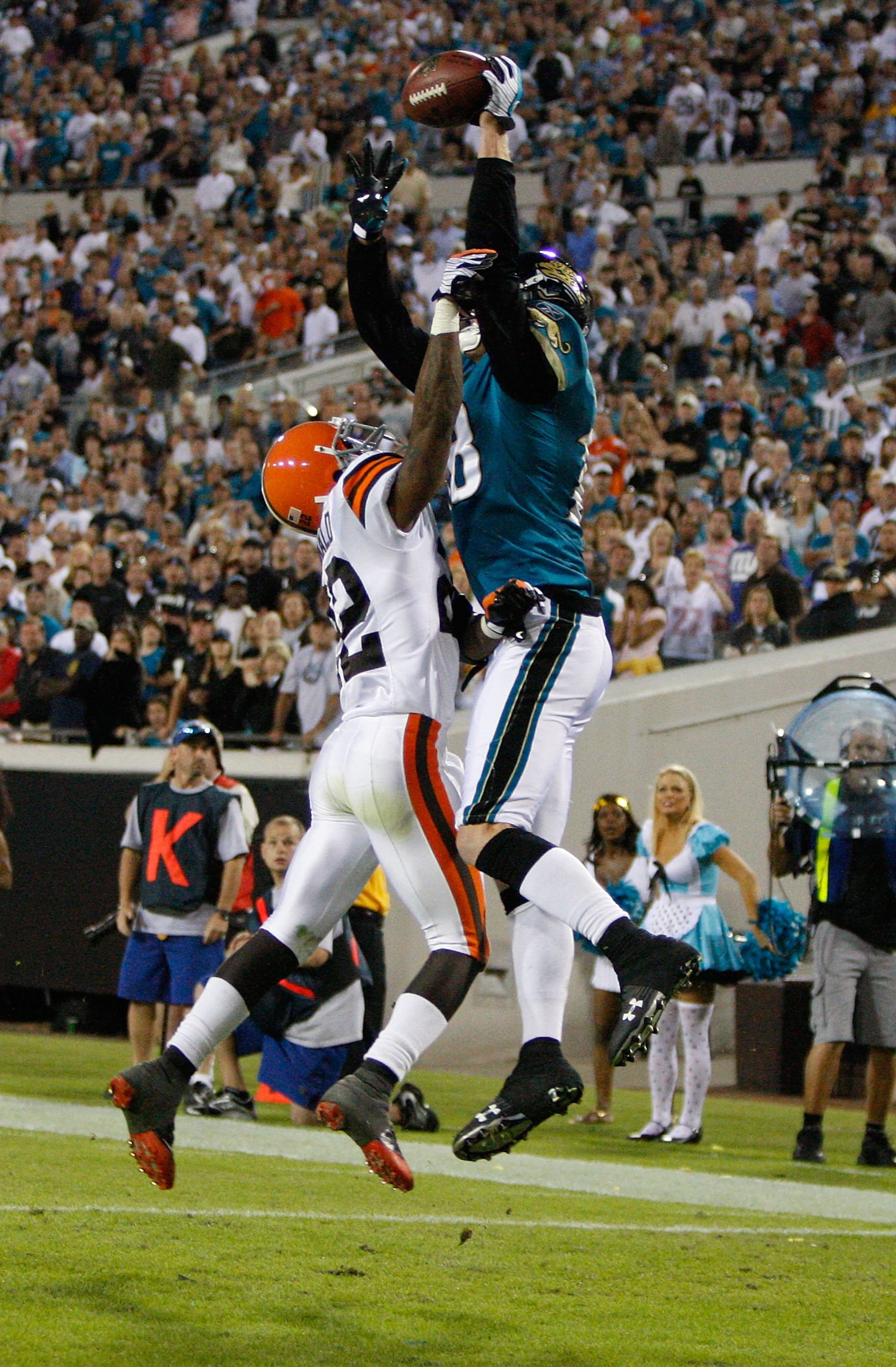 JACKSONVILLE, FL - OCTOBER 26:  Matt Jones #18 of the Jacksonville Jaguars attempts to make a reception against Brandon McDonald #22 of the Cleveland Browns in a game at Jacksonville Muncipal Stadium on October 26, 2008 in Jacksonville, Florida.  (Photo b