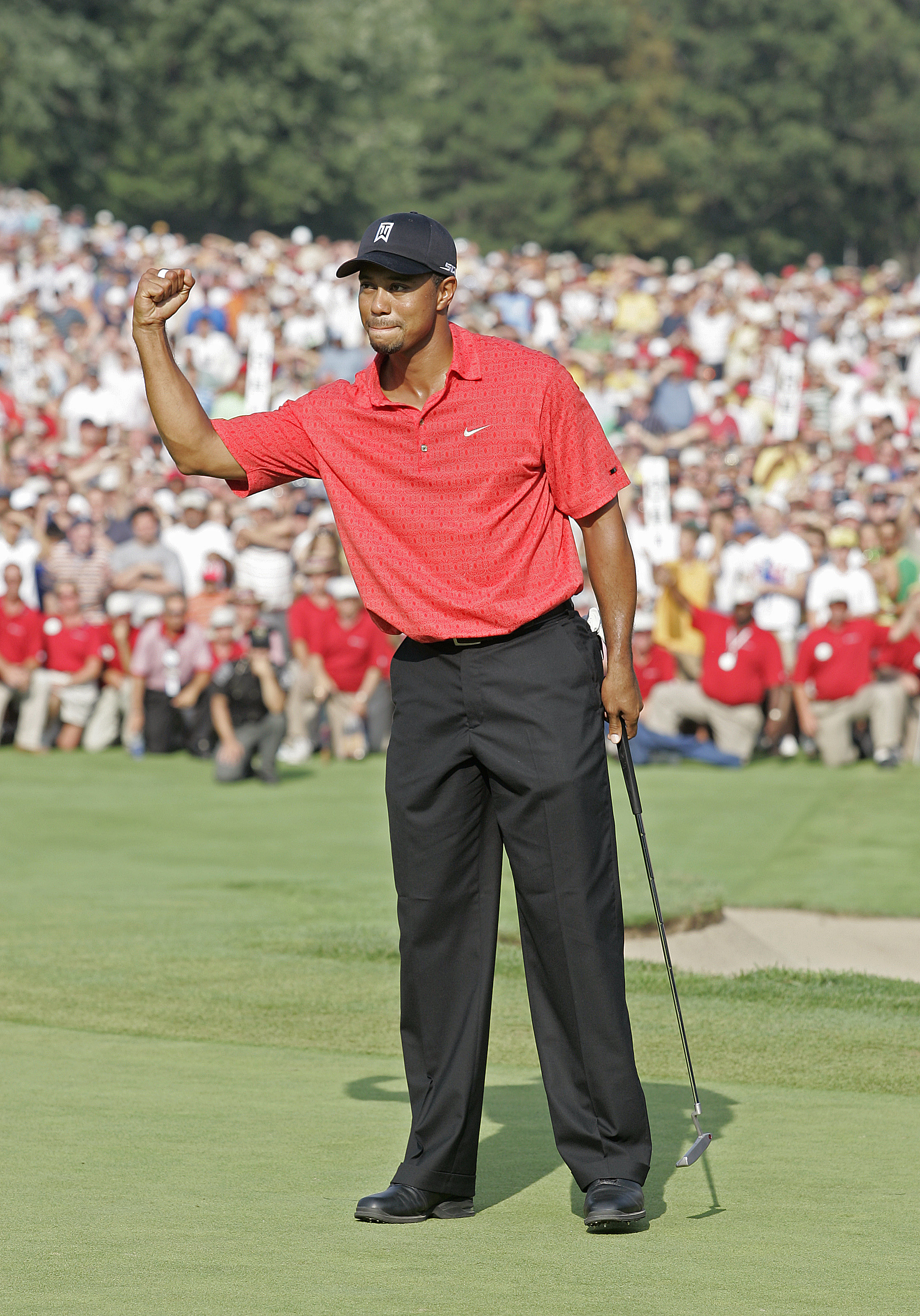 UNITED STATES - AUGUST 06:  Tiger Woods wins his 50th PGA TOUR event during the fourth and final round of the Buick Open at Warwick Hills Golf and Country Club in Grand Blanc, Michigan on August 6, 2006.  (Photo by Michael Cohen/Getty Images)