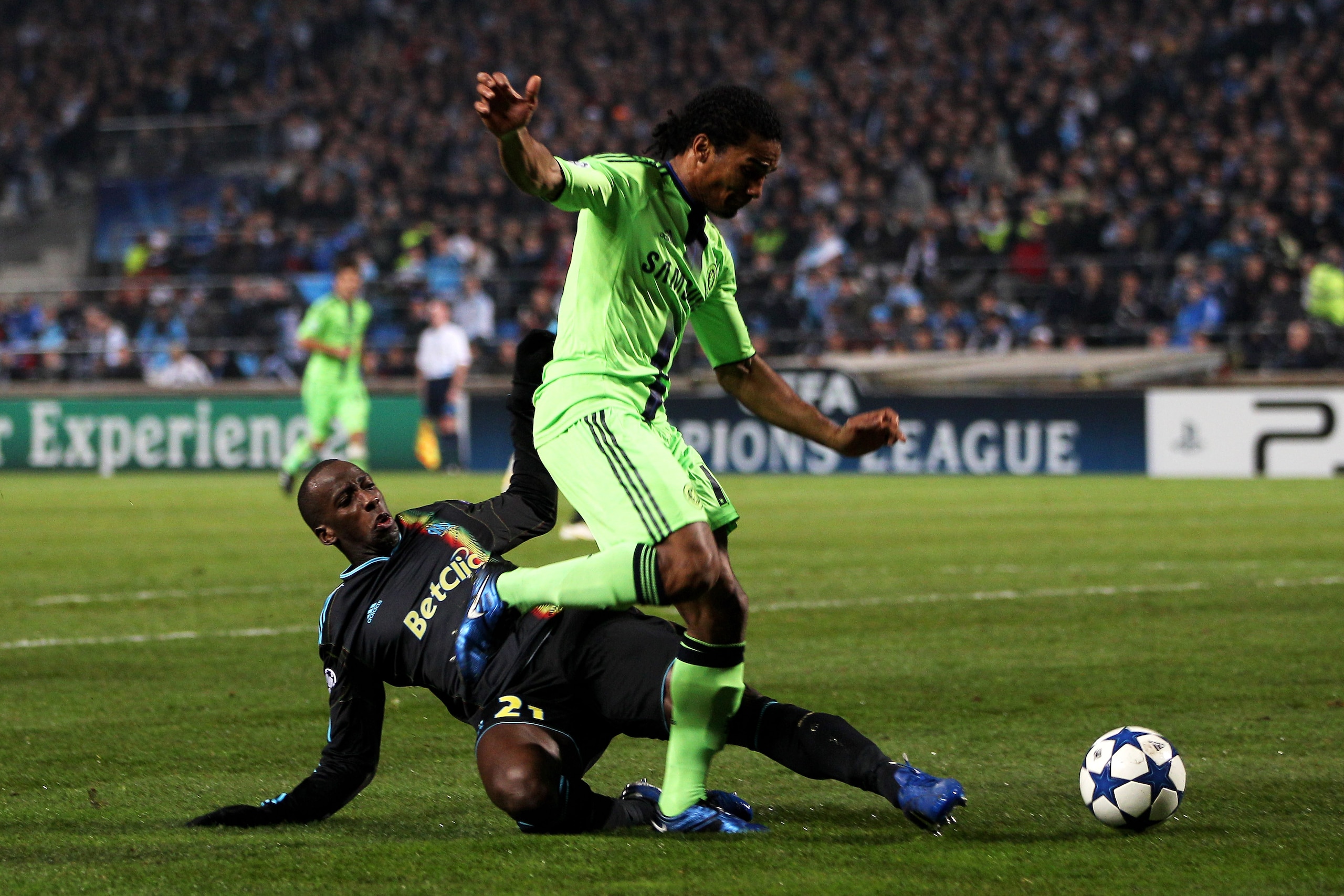 MARSEILLE, FRANCE - DECEMBER 08:  Florent Malouda of Chelsea is brought down in the area by Souleymane Diawara of Marseille, but Referee Vladislav Bezborodov of Russia refuses to award the penalty during the UEFA Champions League Group F match between Mar