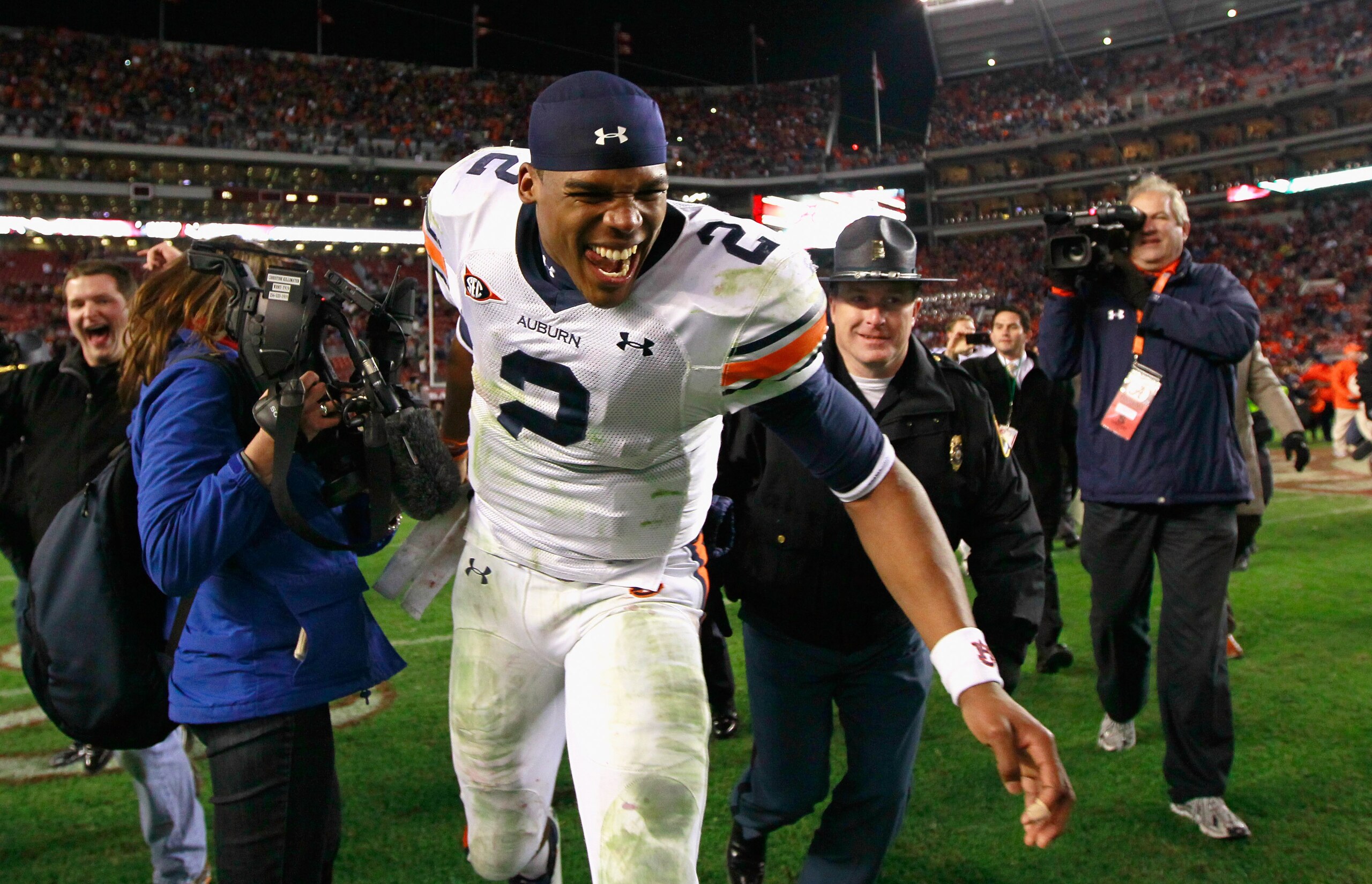 TUSCALOOSA, AL - NOVEMBER 26: Quarterback Cam Newton #2 of the Auburn Tigers celebrates their 28-27 win over the Alabama Crimson Tide at Bryant-Denny Stadium on November 26, 2010 in Tuscaloosa, Alabama. (Photo by Kevin C. Cox/Getty Images) TUSCALOOSA, AL - NOVEMBER 26: Quarterback Cam Newton #2 of the Auburn Tigers celebrates their 28-27 win over the Alabama Crimson Tide at Bryant-Denny Stadium on November 26, 2010 in Tuscaloosa, Alabama. (Photo by Kevin C. Cox/Getty Images)
