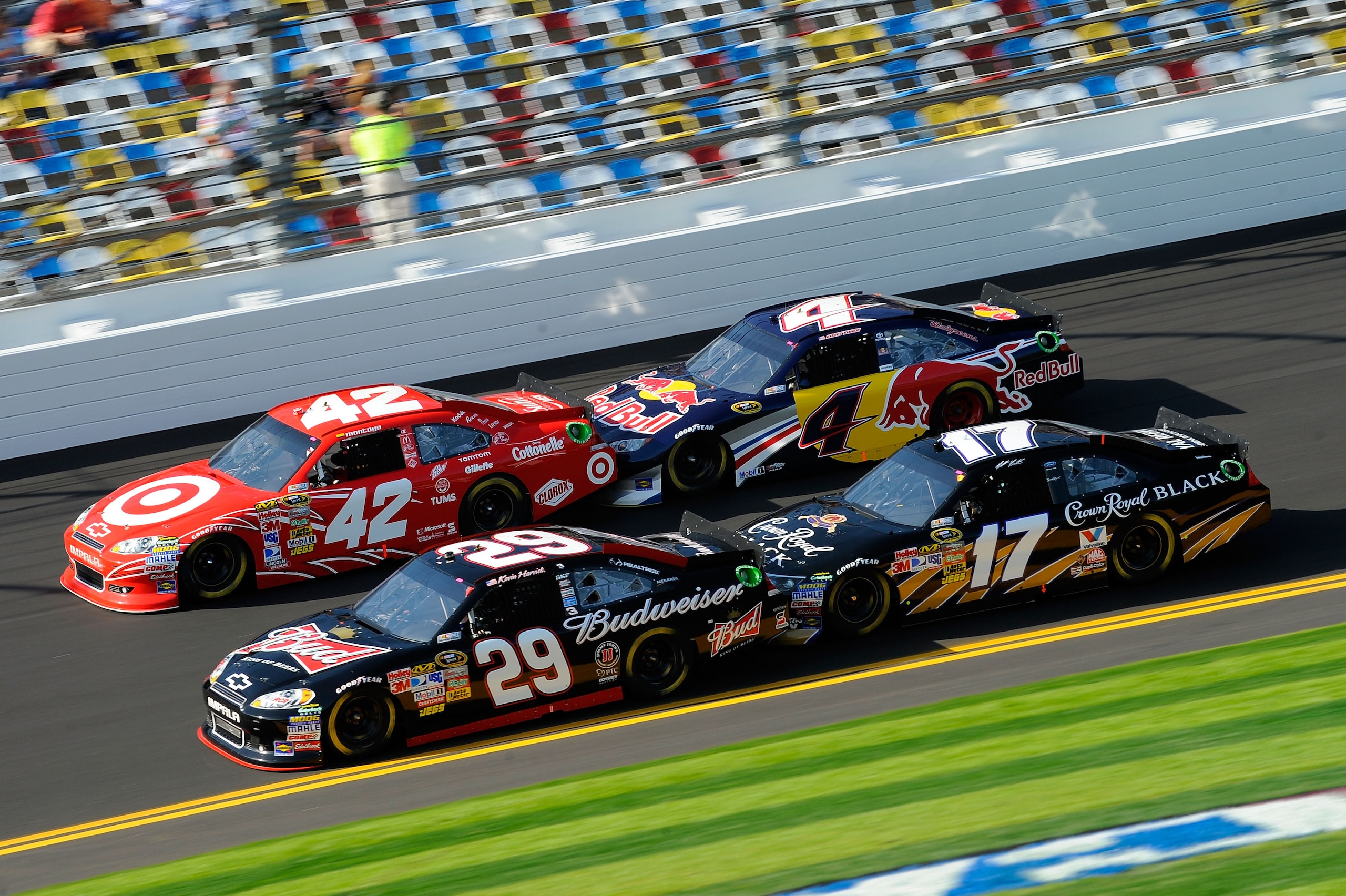 DAYTONA BEACH, FL - FEBRUARY 17:  Kevin Harvick, driver of the #29 Budweiser Chevrolet, Juan Pablo Montoya, driver of the #42 Target Chevrolet, Kasey Kahne, driver of the #4 Red Bull Toyota, and Matt Kenseth, driver of the #17 Crown Royal Ford, race durin