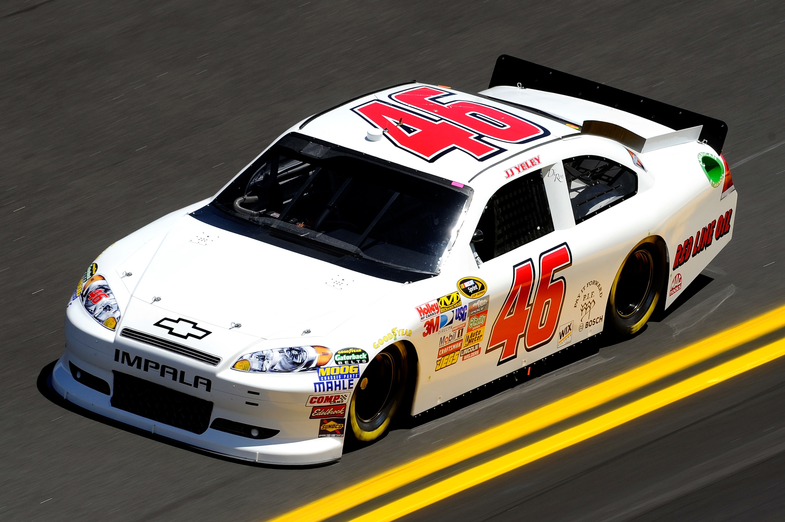 DAYTONA BEACH, FL - FEBRUARY 12:  J.J. Yeley, driver of the #46 Red Line Oil Chevrolet, practices for the NASCAR Sprint Cup Series Daytona 500 at Daytona International Speedway on February 12, 2011 in Daytona Beach, Florida.  (Photo by John Harrelson/Gett