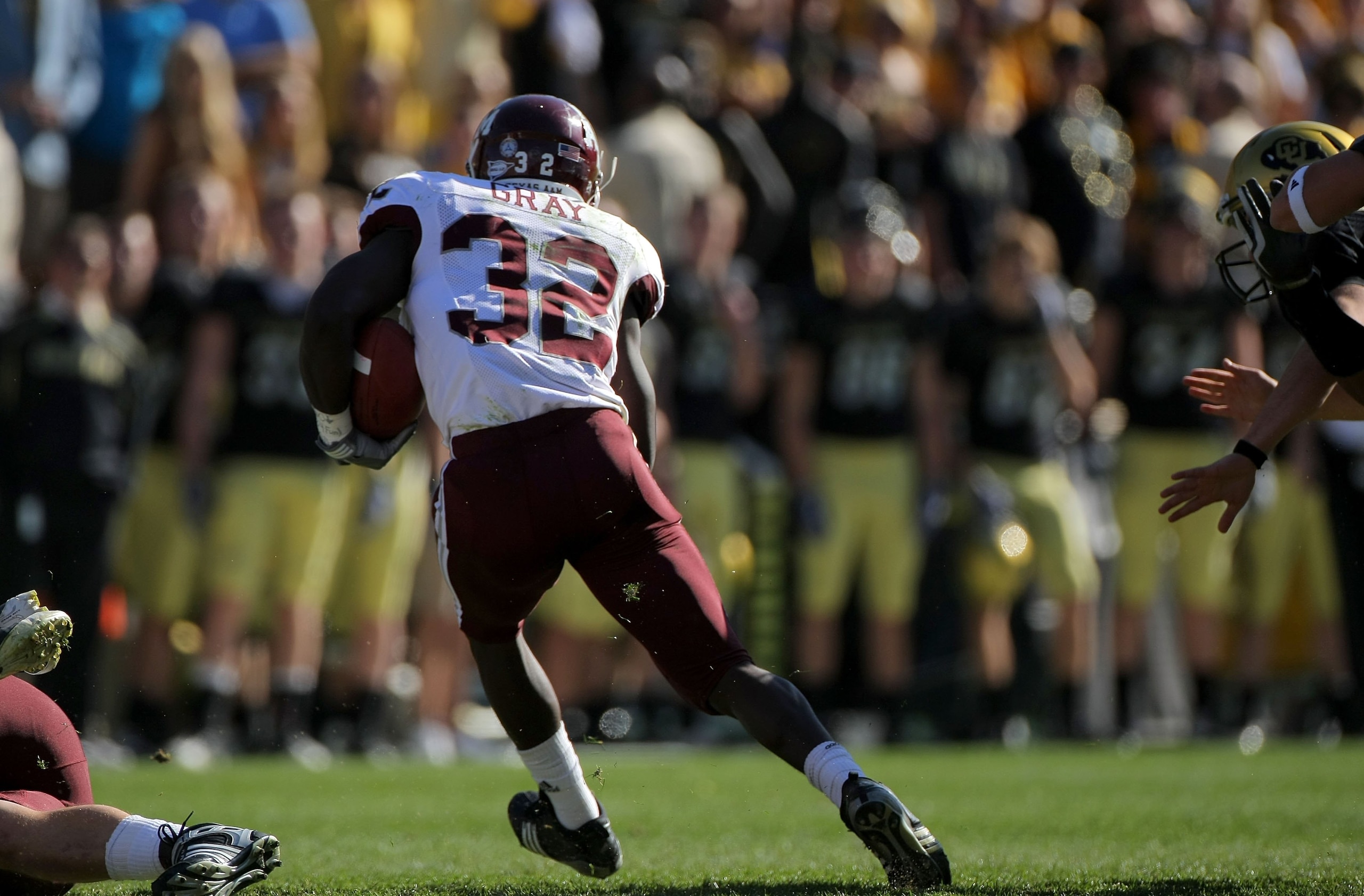BOULDER, CO - NOVEMBER 07: Cyrus Gray #32 of the Texas A&M Aggies returns a kick off for a touchdown against the Colorado Buffaloes during NCAA college football action at Folsom Field on November 7, 2009 in Boulder, Colorado. Colorado defeated Texas A&M BOULDER, CO - NOVEMBER 07: Cyrus Gray #32 of the Texas A&M Aggies returns a kick off for a touchdown against the Colorado Buffaloes during NCAA college football action at Folsom Field on November 7, 2009 in Boulder, Colorado. Colorado defeated Texas A&M