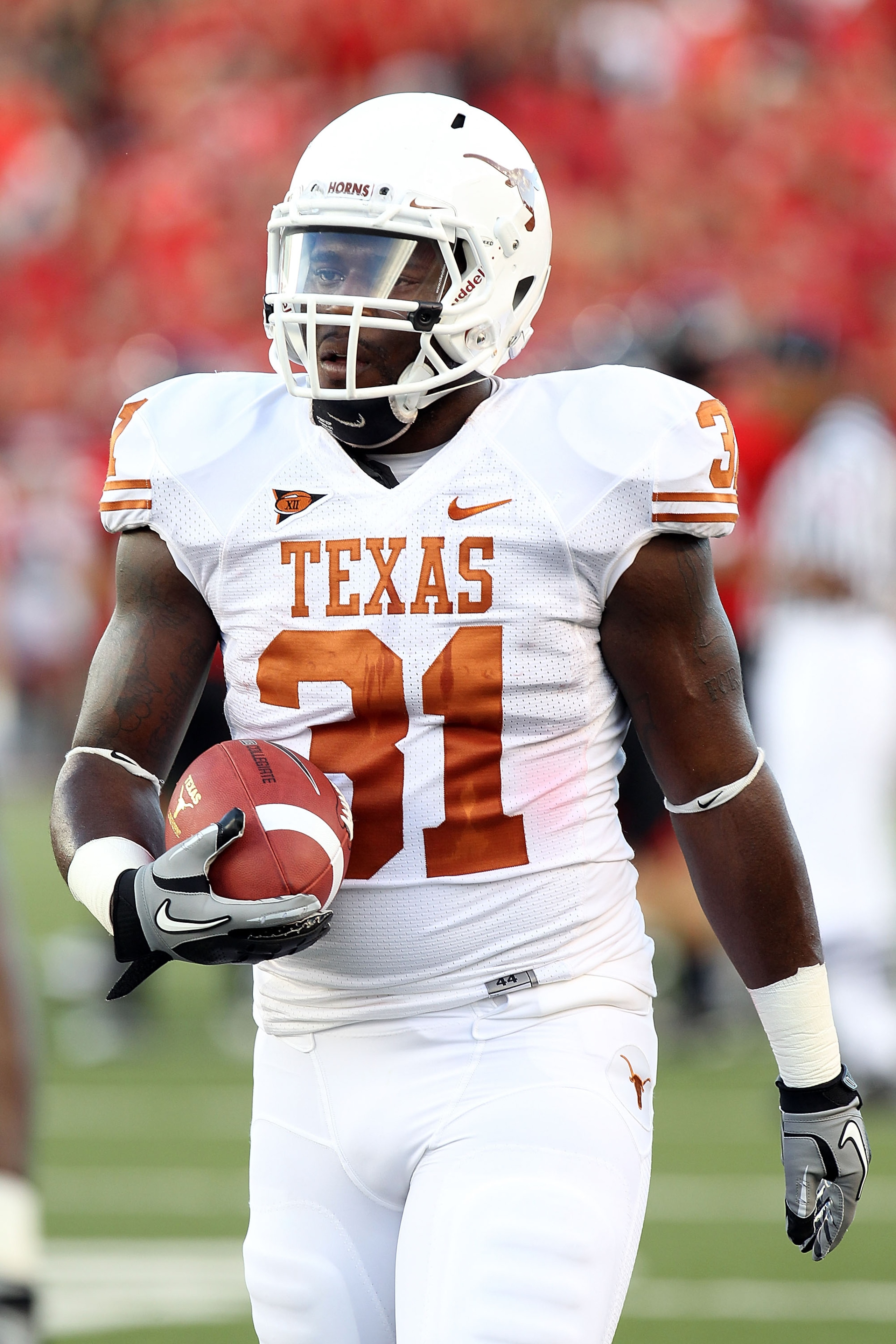 LUBBOCK, TX - SEPTEMBER 18: Running back Cody Johnson #31 of the Texas Longhorns at Jones AT&T Stadium on September 18, 2010 in Lubbock, Texas. (Photo by Ronald Martinez/Getty Images) LUBBOCK, TX - SEPTEMBER 18: Running back Cody Johnson #31 of the Texas Longhorns at Jones AT&T Stadium on September 18, 2010 in Lubbock, Texas. (Photo by Ronald Martinez/Getty Images)