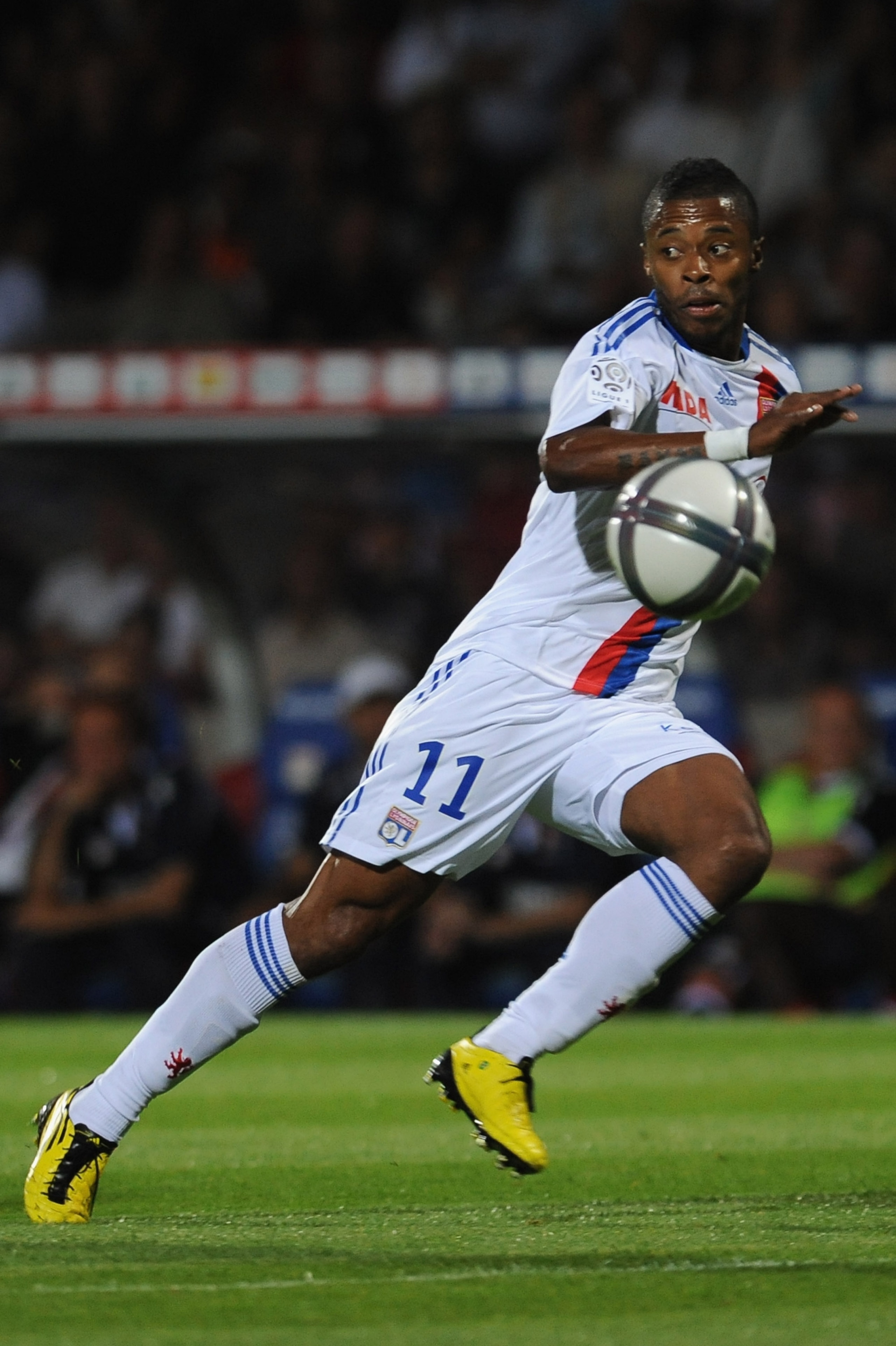 LYON, FRANCE - AUGUST 07:  Michel Fernandes Bastos of Olympique Lyonnais in action during the Ligue 1 match between Olympique Lyonnais and AS Monaco FC at Gerland Stadium on August 7, 2010 in Lyon, France.  (Photo by Valerio Pennicino/Getty Images)