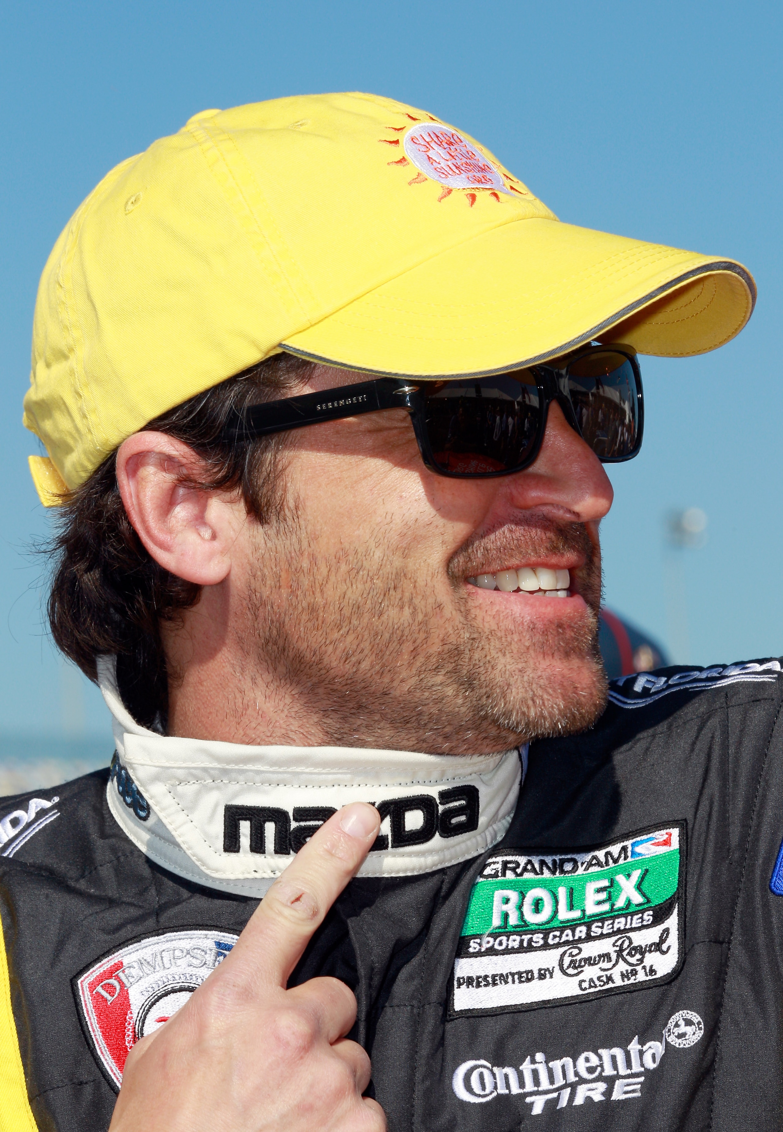 DAYTONA BEACH, FL - JANUARY 29:  Patrick Dempsey, driver of the #40 Mazda/Visit Florida Mazda RX-8, smiles prior to the start of the Rolex 24 at Daytona International Speedway on January 29, 2011 in Daytona Beach, Florida.  (Photo by Sam Greenwood/Getty I