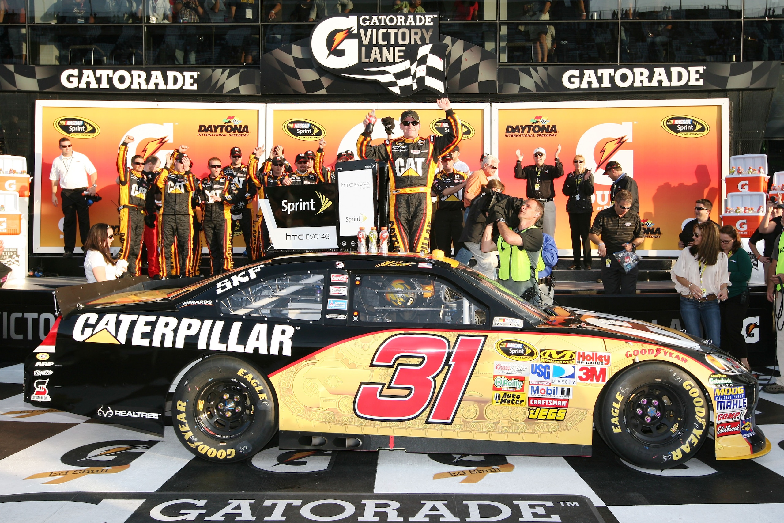 DAYTONA BEACH, FL - FEBRUARY 17:  Jeff Burton, driver of the #31 Caterpillar Chevrolet, celebrates in Victory Lane after winning the second race of the NASCAR Sprint Cup Series Gatorade Duel at Daytona International Speedway on February 17, 2011 in Dayton