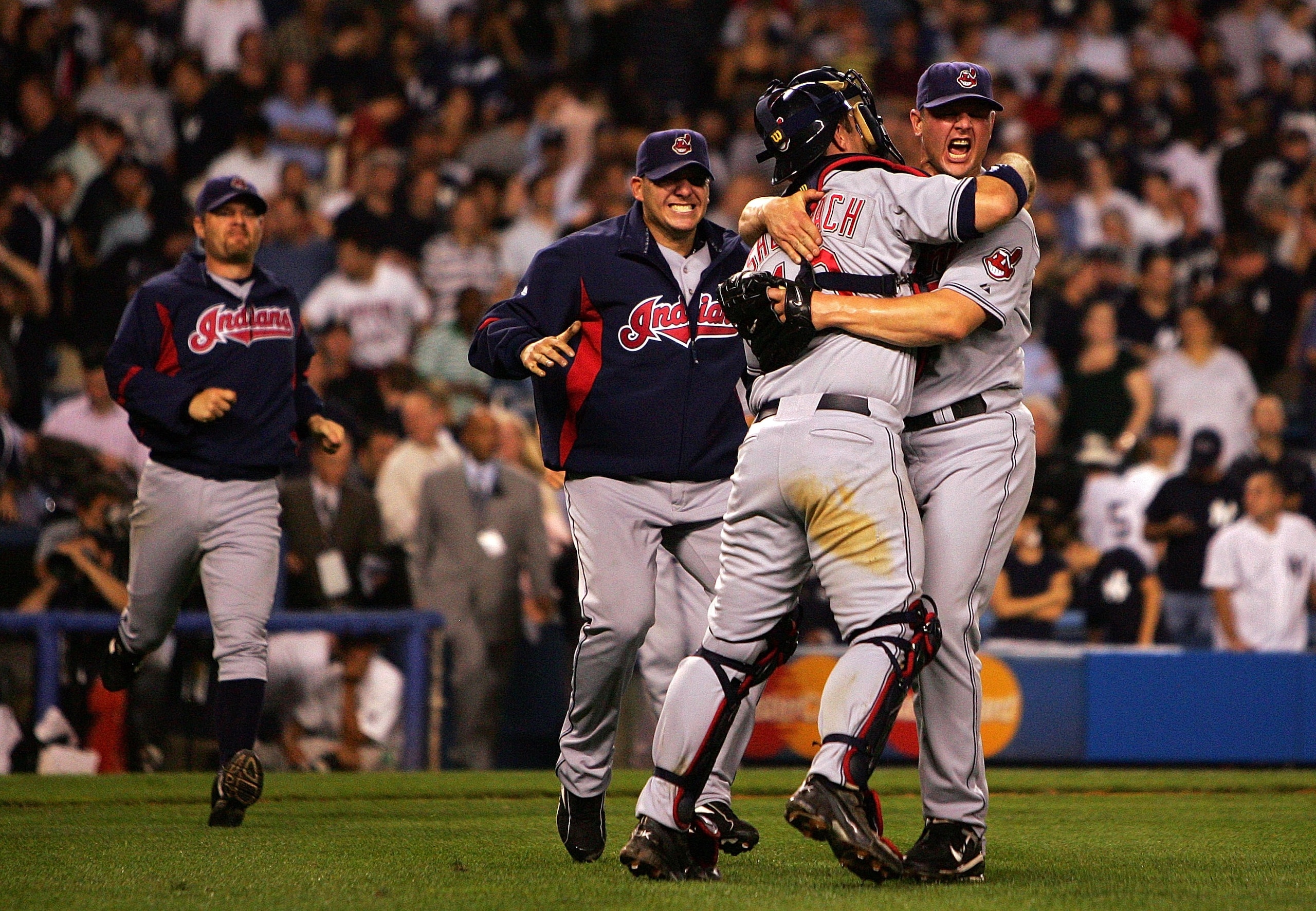 NEW YORK - OCTOBER 08:  Joe Borowski #47 and Kelly Shoppach #10 of the Cleveland Indians celebrate after defeating the New York Yankees by the score of 6-4 to win the American League Division Series in four games at Yankee Stadium on October 8, 2007 in th