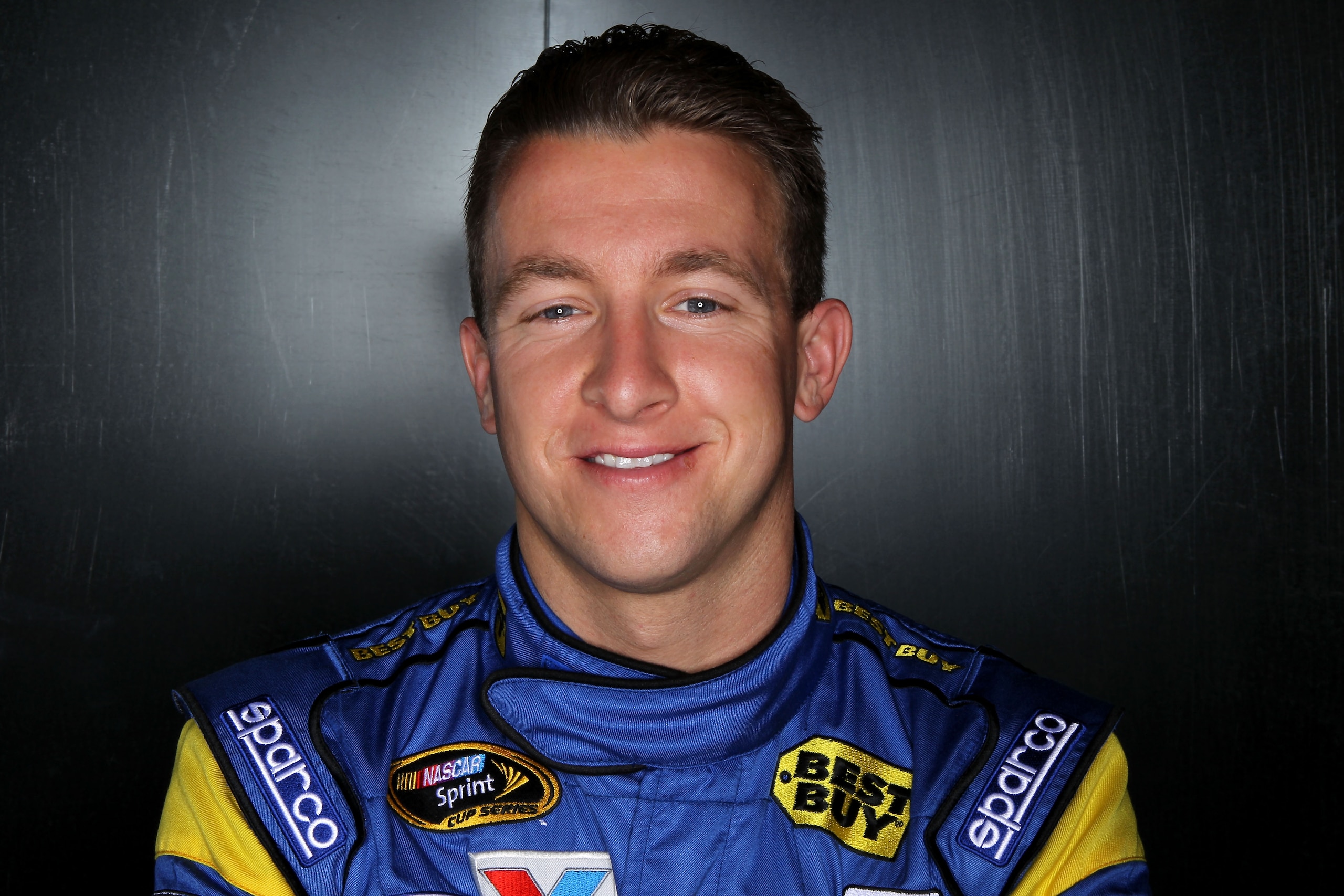 DAYTONA BEACH, FL - FEBRUARY 10:  AJ Allmendinger, driver of the #43 Best Buy Ford, poses during the 2011 NASCAR Media Day at Daytona International Speedway on February 10, 2011 in Daytona Beach, Florida.  (Photo by Nick Laham/Getty Images for NASCAR)
