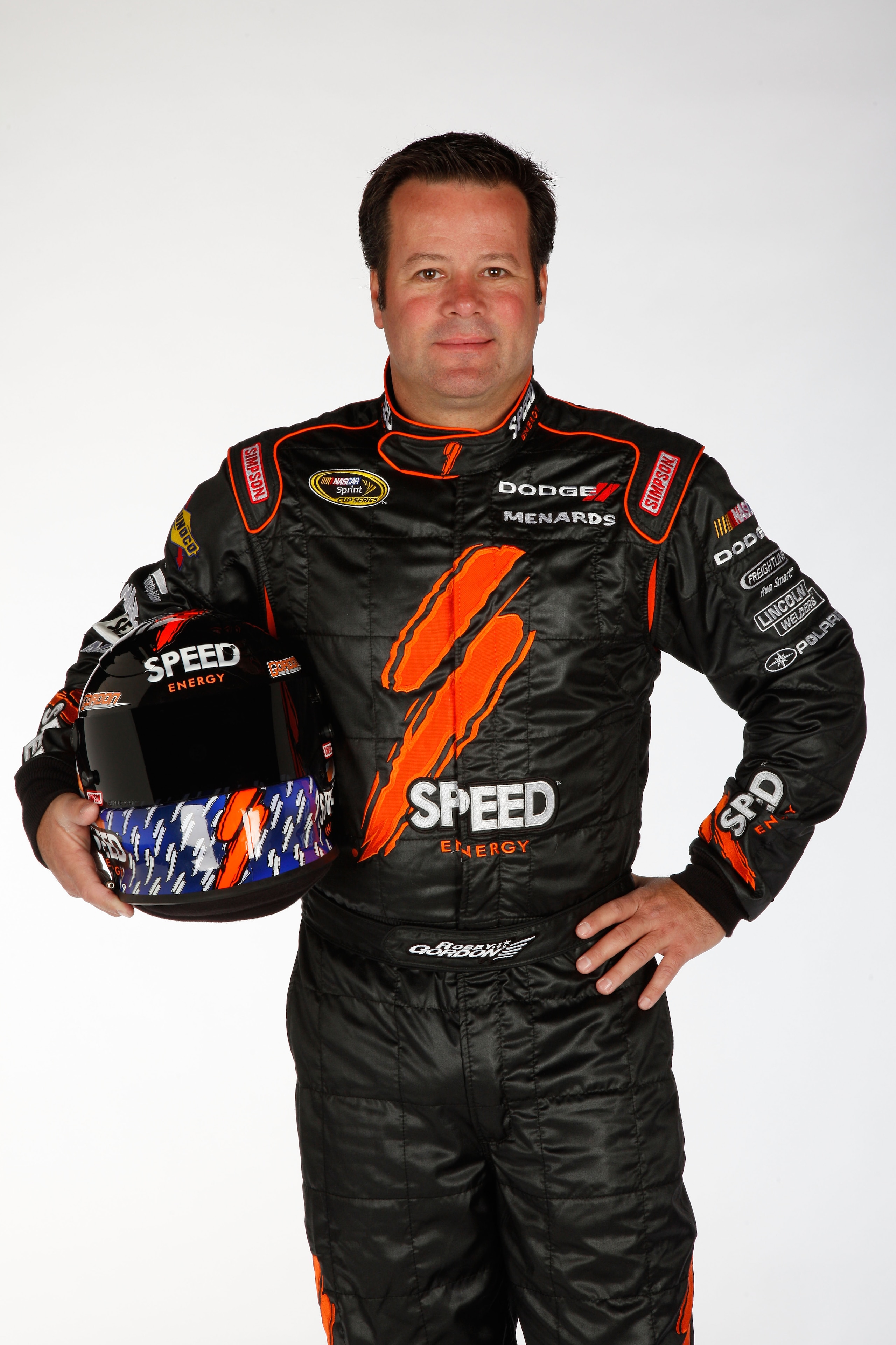 DAYTONA BEACH, FL - FEBRUARY 10:  Robby Gordon, driver of the #7 Speed Energy Drink Toyota, poses during the 2011 NASCAR Sprint Cup Series Media Day at Daytona International Speedway on February 10, 2011 in Daytona Beach, Florida.  (Photo by Chris Graythe