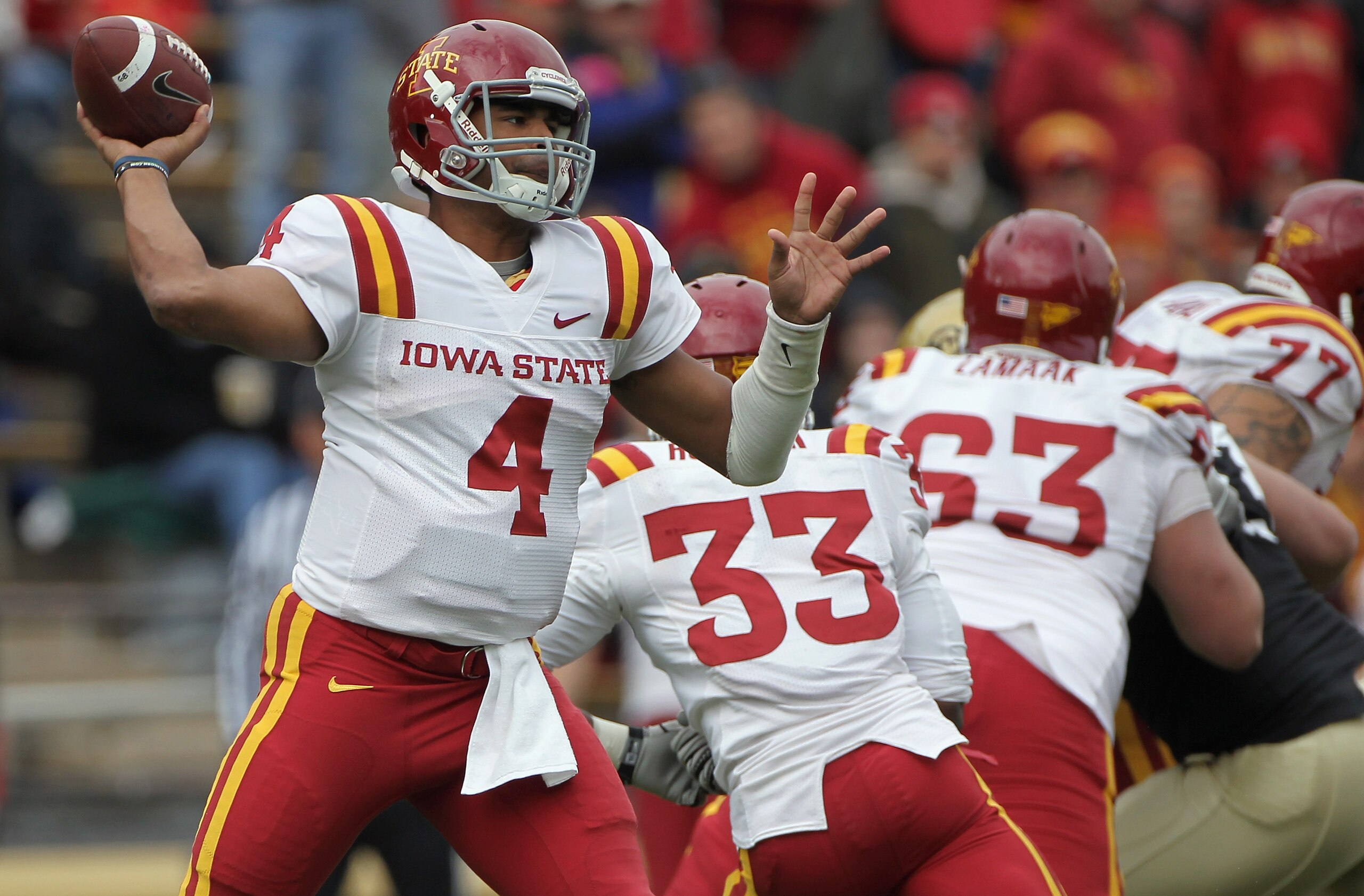 BOULDER, CO - NOVEMBER 13: Quarterback Austen Arnaud #4 of the Iowa State Cyclones delivers a pass against the Colorado Buffaloes at Folsom Field on November 13, 2010 in Boulder, Colorado. Colorado defeated Iowa State 34-14. (Photo by Doug Pensinger/Get BOULDER, CO - NOVEMBER 13: Quarterback Austen Arnaud #4 of the Iowa State Cyclones delivers a pass against the Colorado Buffaloes at Folsom Field on November 13, 2010 in Boulder, Colorado. Colorado defeated Iowa State 34-14. (Photo by Doug Pensinger/Get