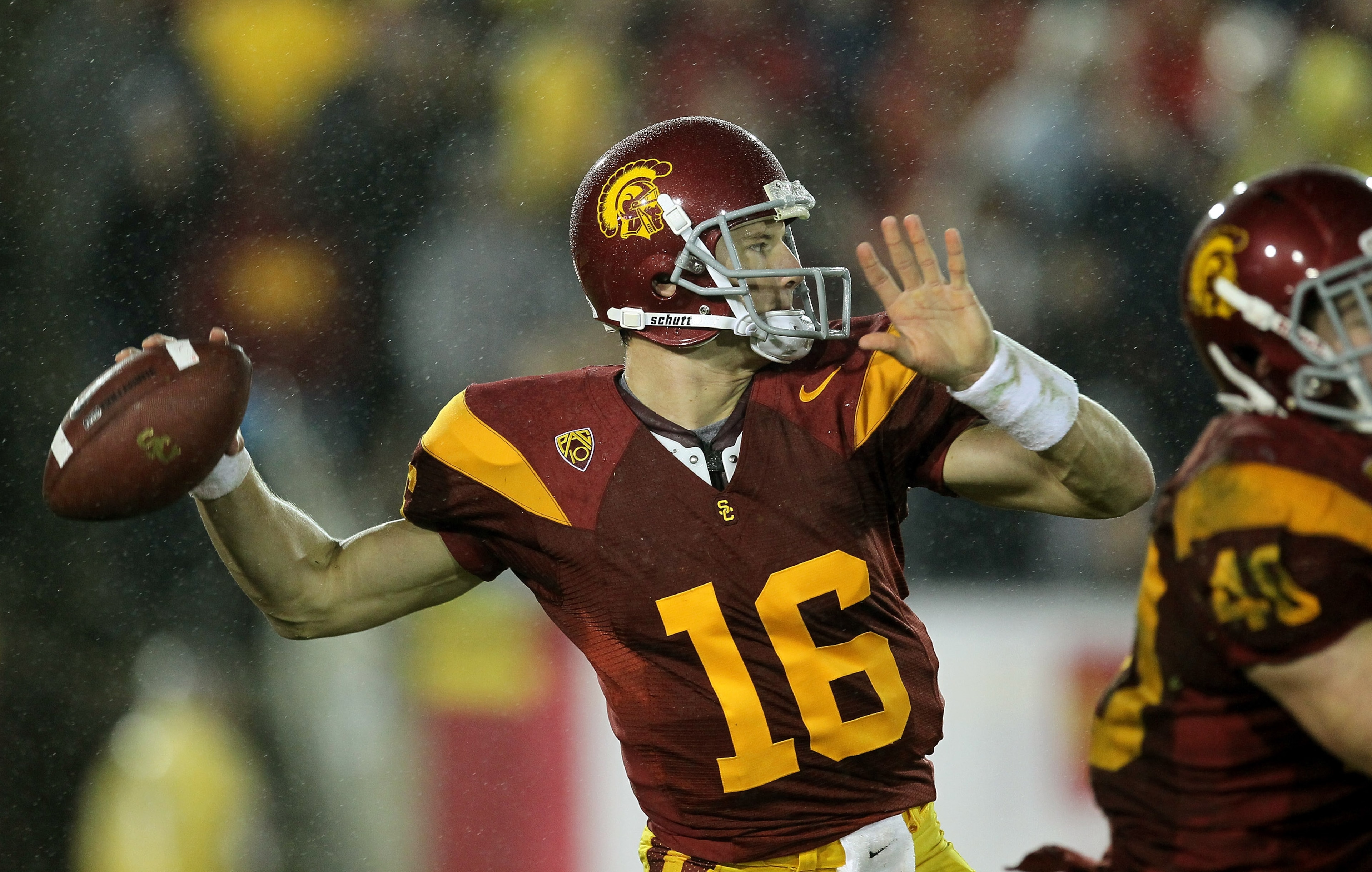 LOS ANGELES - NOVEMBER 27: Quarterback Mitch Mustain #16 of the USC Trojans throws a pass against the Notre Dame Fighting Irish at the Los Angeles Memorial Coliseum on November 27, 2010 in Los Angeles, California. Notre Dame won 20-16. (Photo by Stephen LOS ANGELES - NOVEMBER 27: Quarterback Mitch Mustain #16 of the USC Trojans throws a pass against the Notre Dame Fighting Irish at the Los Angeles Memorial Coliseum on November 27, 2010 in Los Angeles, California. Notre Dame won 20-16. (Photo by Stephen