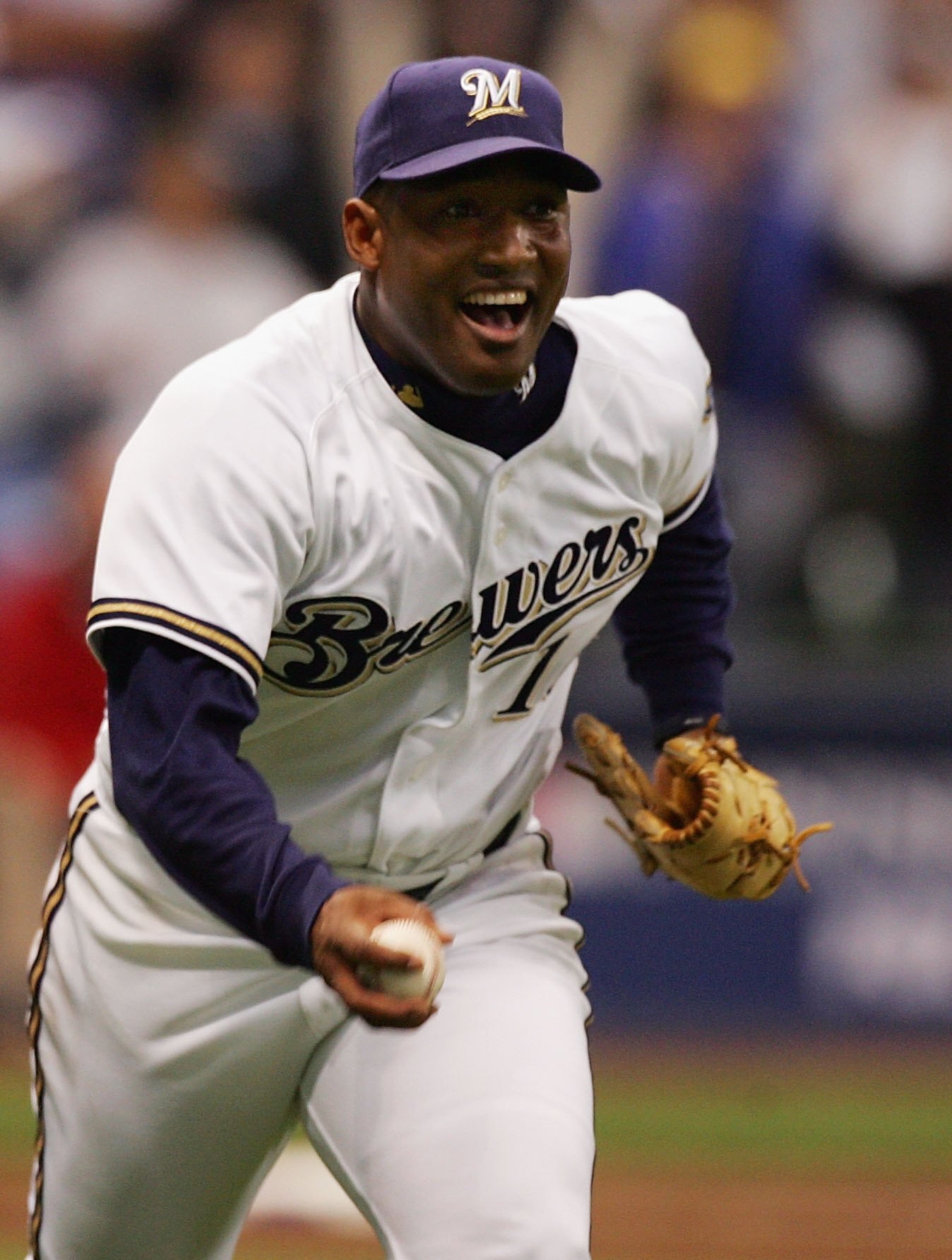 MILWAUKEE - OCTOBER 04: Salomon Torres #16 of the Milwaukee Brewers tosses the ball to first base for the final out against the Philadelphia Phillies in Game three of the NLDS during the 2008 MLB playoffs at Miller Park on October 4, 2008 in Milwaukee, Wi