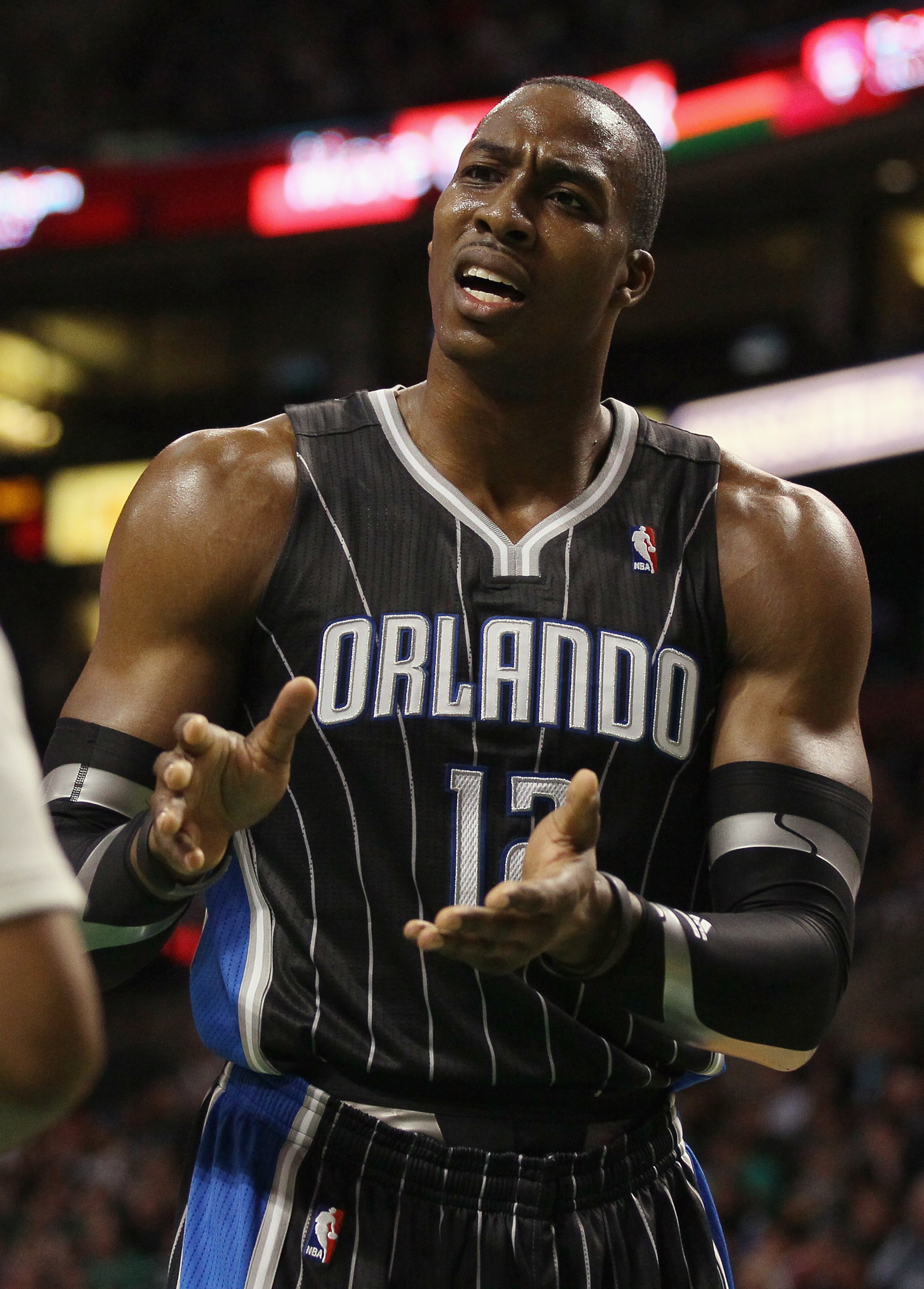 BOSTON, MA - JANUARY 17:  Dwight Howard #12 of the Orlando Magic reacts to a call in the first quarter as they take on the Boston Celtics on January 17, 2011 at the TD Garden in Boston, Massachusetts.  NOTE TO USER: User expressly acknowledges and agrees